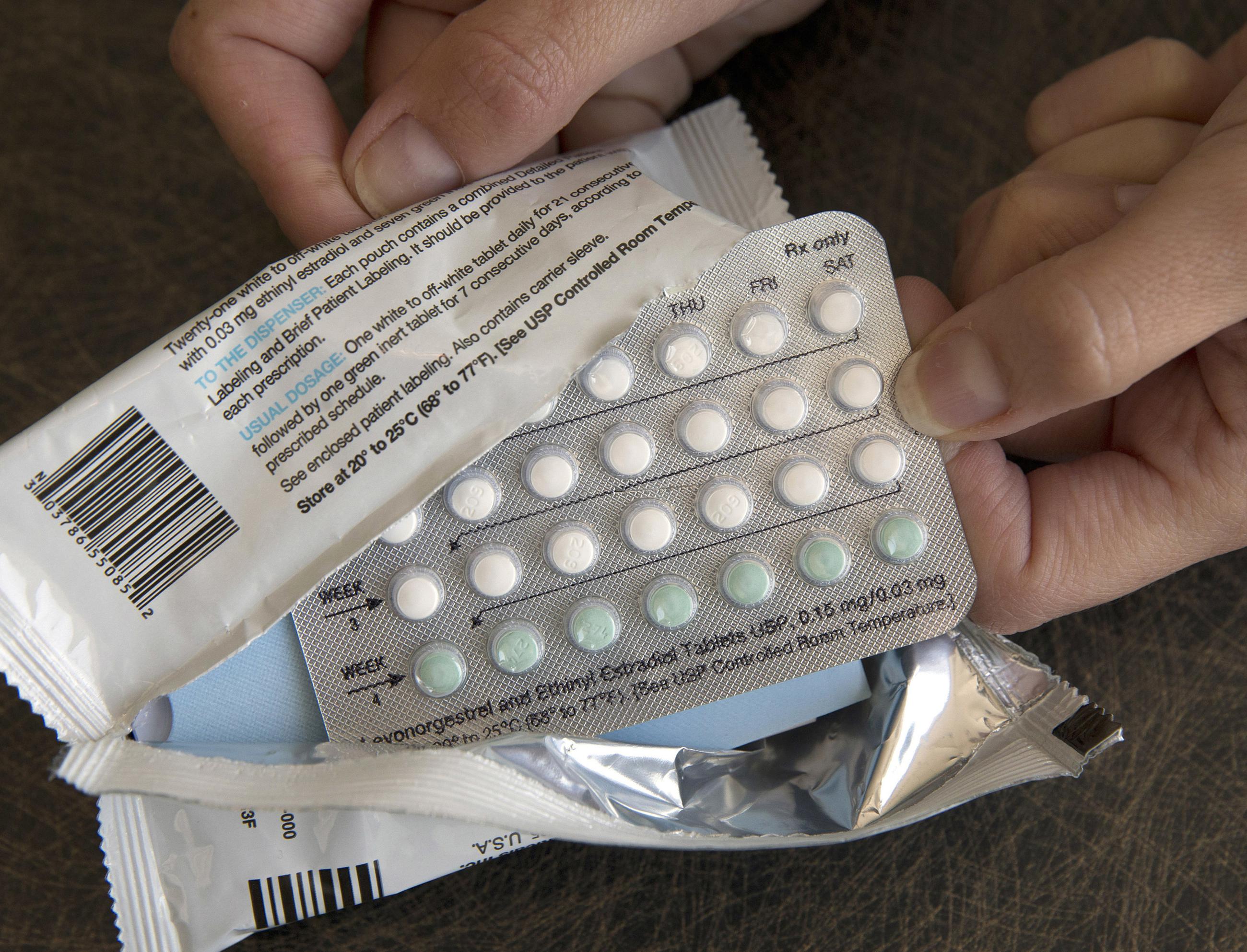 FILE - A one-month dosage of hormonal birth-control pills