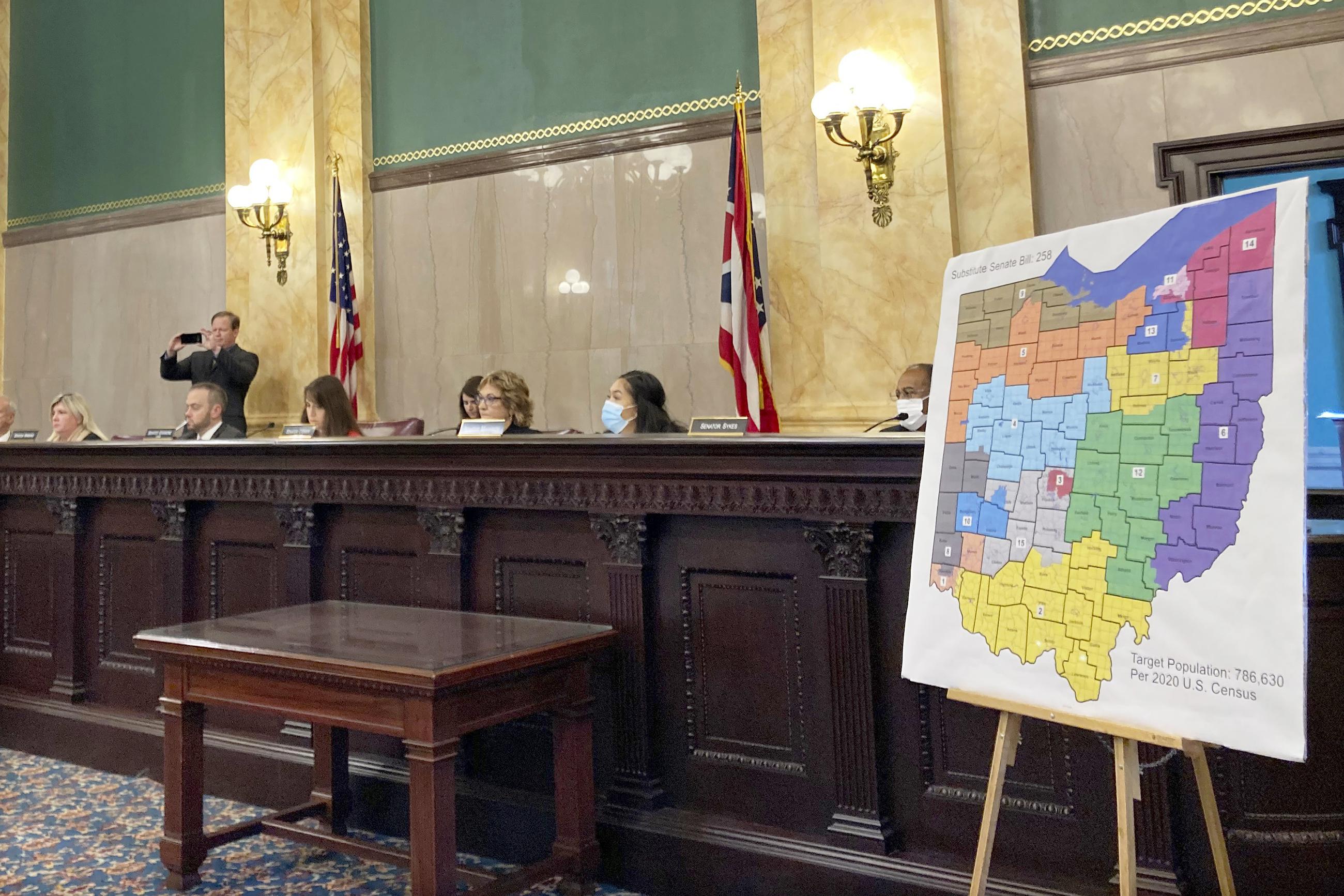 Members of the Ohio Senate Government Oversight Committee hear testimony on a new map of state congressional districts, Nov. 16, 2021. (AP Photo/Julie Carr Smyth)
