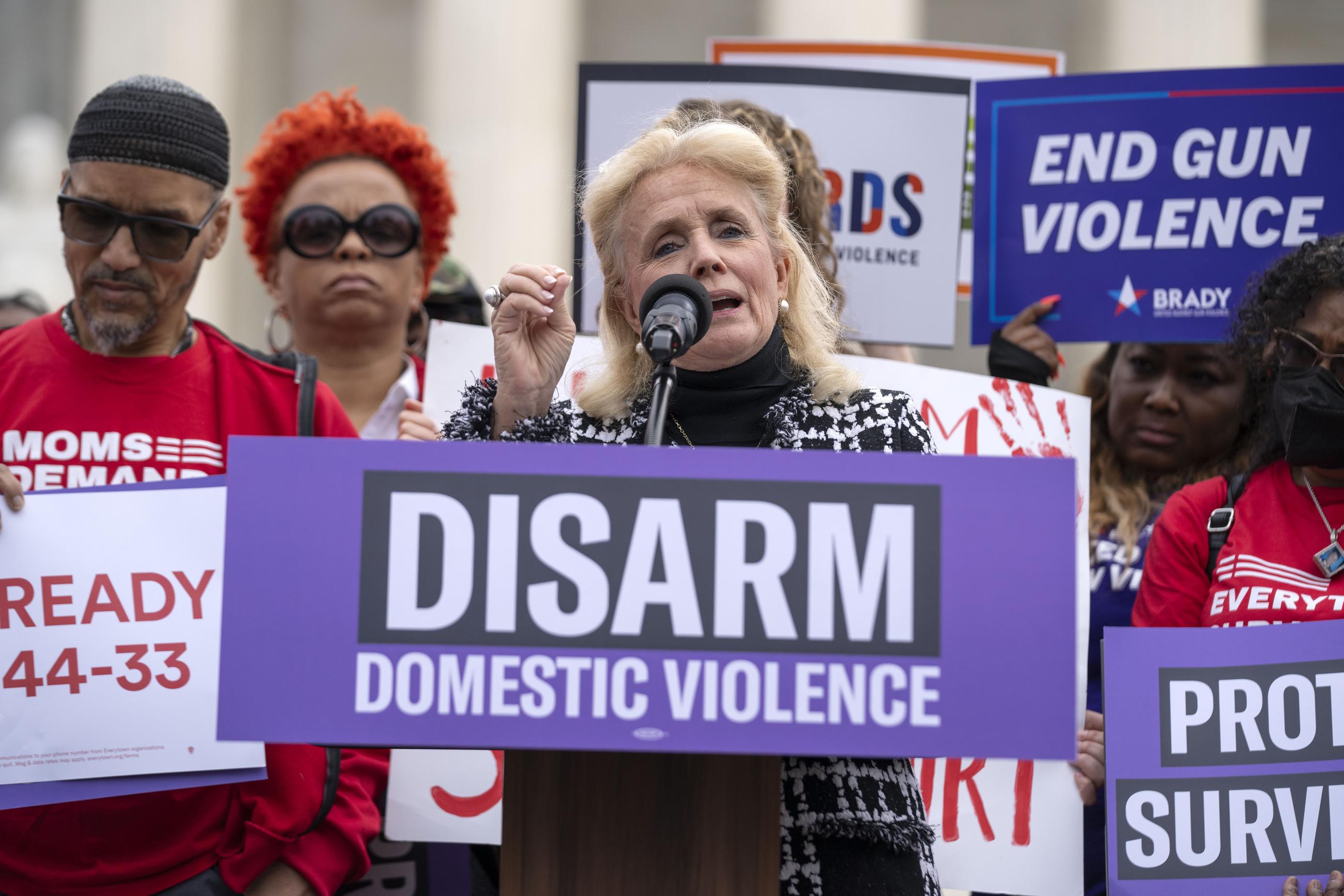 Rep. Debbie Dingell speaking during a rally at the Supreme Court in November 2023, as the Court was taking up a challenge to a federal law that prohibits people from having guns if they are under a court order to stay away from their spouse, partner, or other family members. (AP Photo/Mark Schiefelbein)