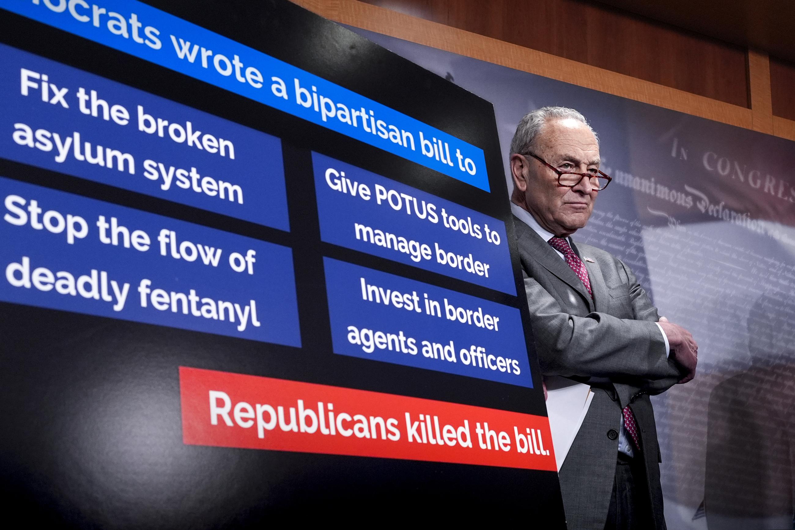 Senate Majority Leader Chuck Schumer pauses during a news conference Thursday after Senate Republicans blocked a bipartisan border-security and immigration bill for a second time this year. (AP Photo/J. Scott Applewhite)