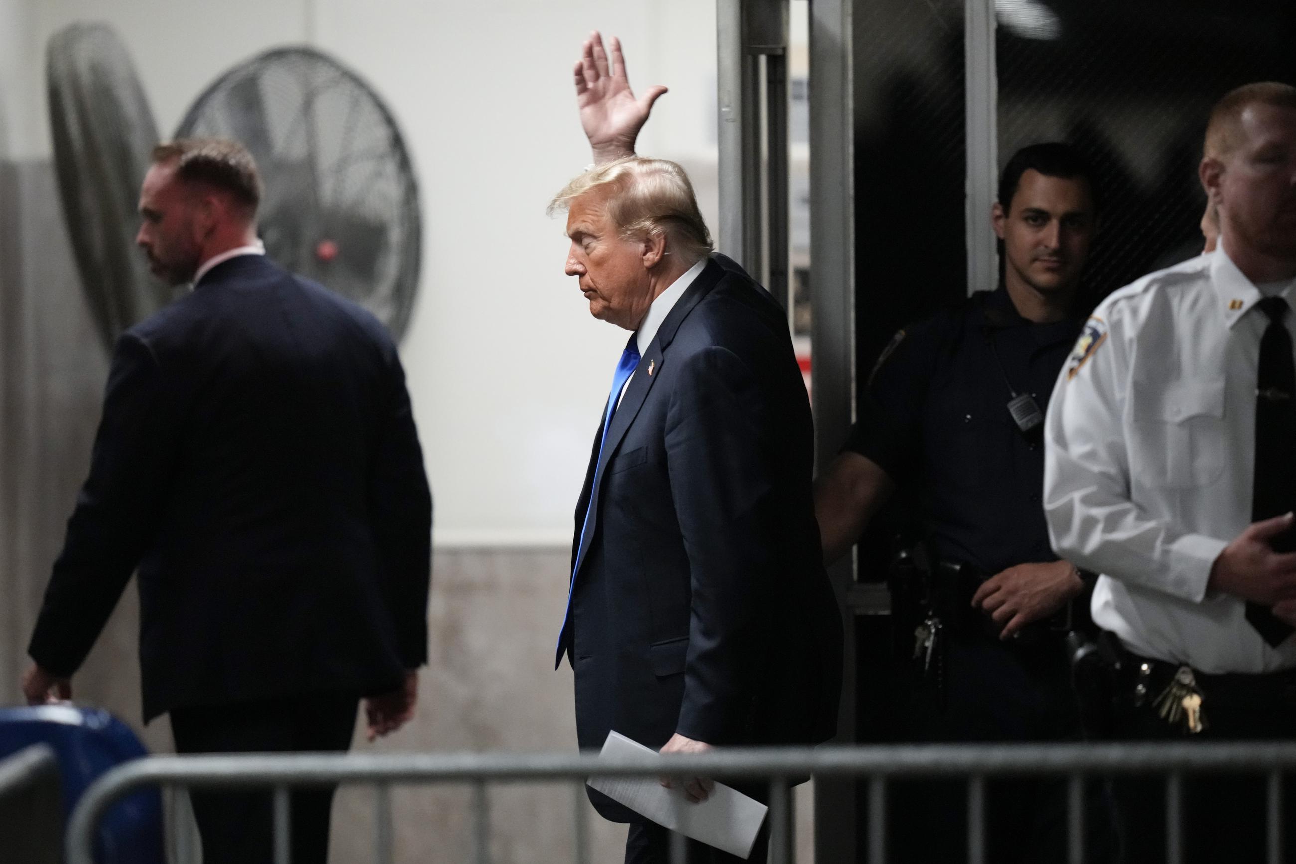 Former President Trump leaves the courtroom during his trial at Manhattan criminal court on Thursday. (AP Photo/Seth Wenig, Pool)