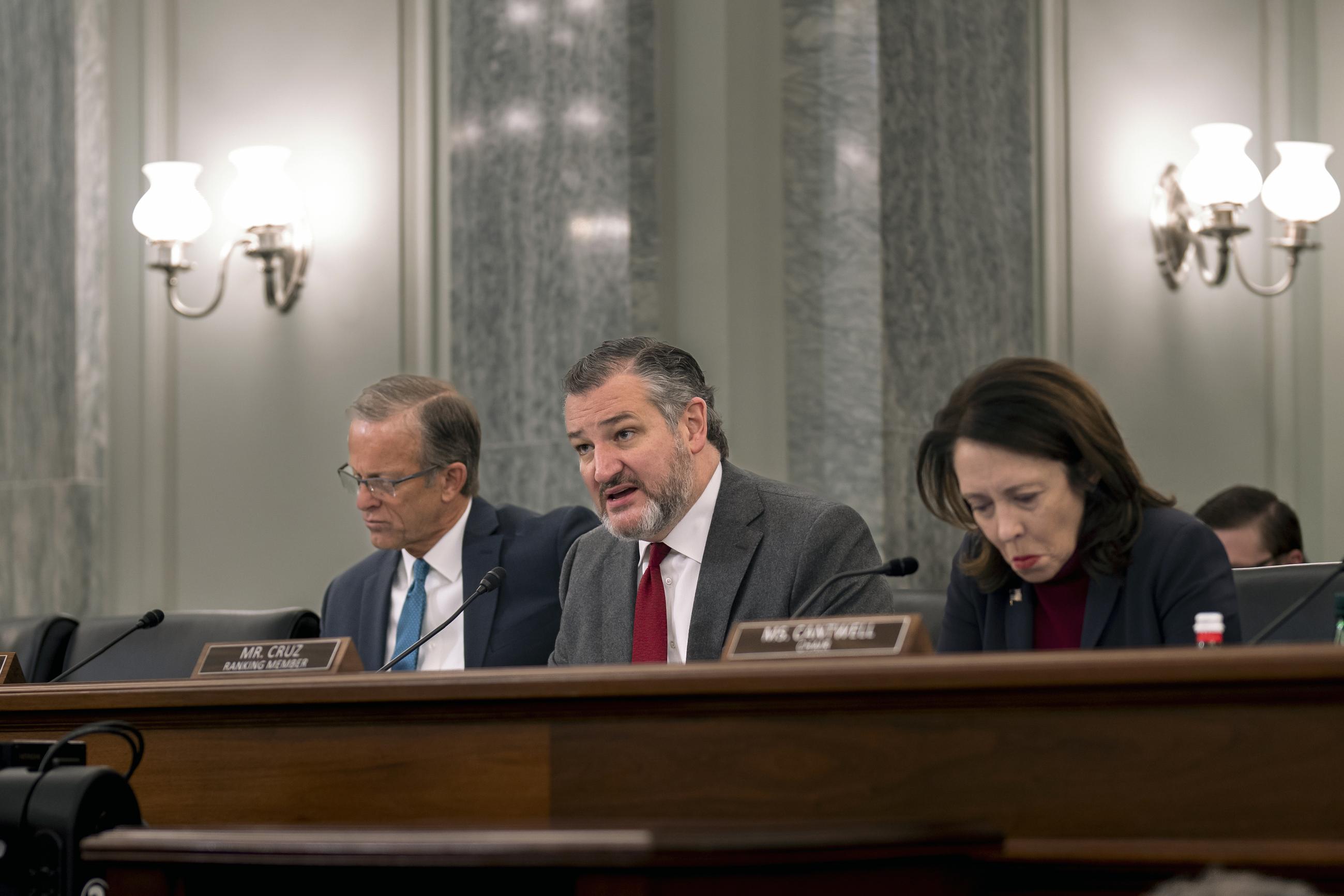 Senate Commerce ranking member Ted Cruz (center), with Chair Maria Cantwell (right) and Sen. John Thune (left) at a hearing on the FAA in 2023 (AP Photo/J. Scott Applewhite)