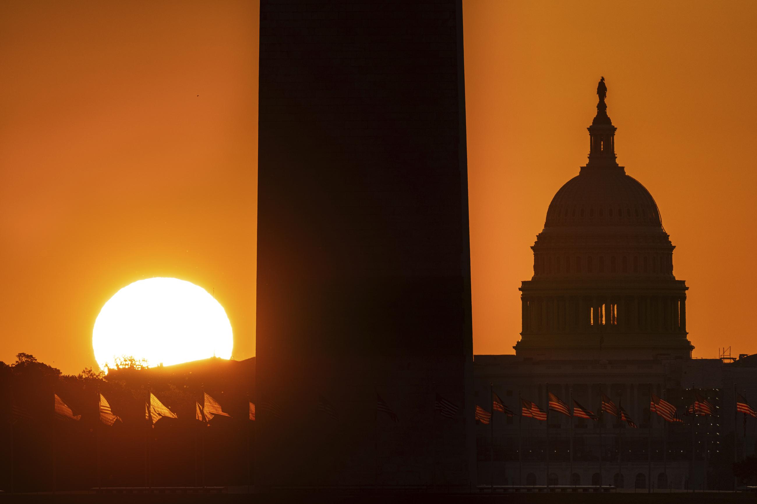 The Washington Monument and the U.S. Capitol Building (AP Photo/J. David Ake)