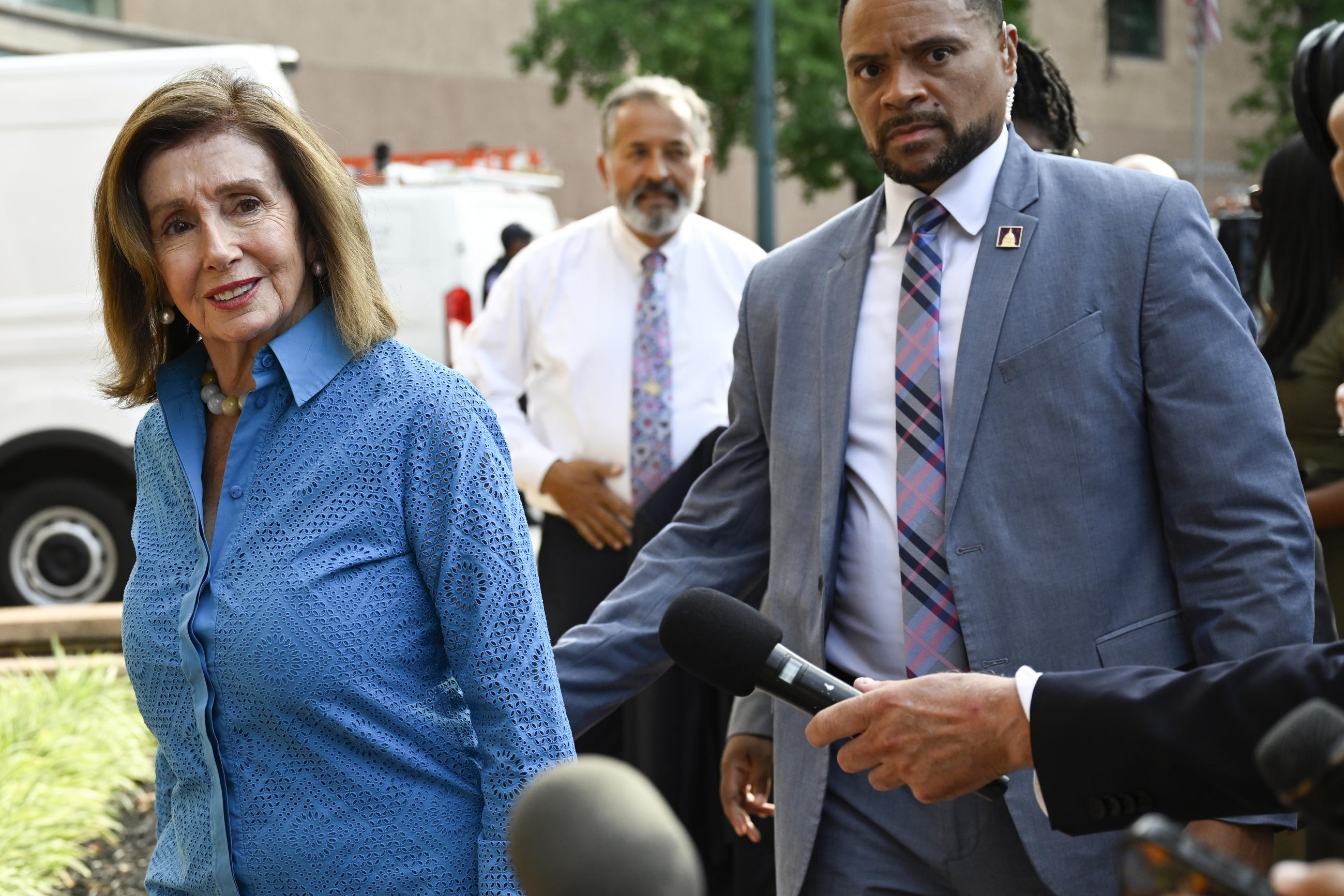 Rep. Nancy Pelosi, the speaker emerita, arrives at the Democratic National Headquarters with other Democratic House members to discuss the future of President Biden's candidacy on Tuesday. (AP Photo/John McDonnell)