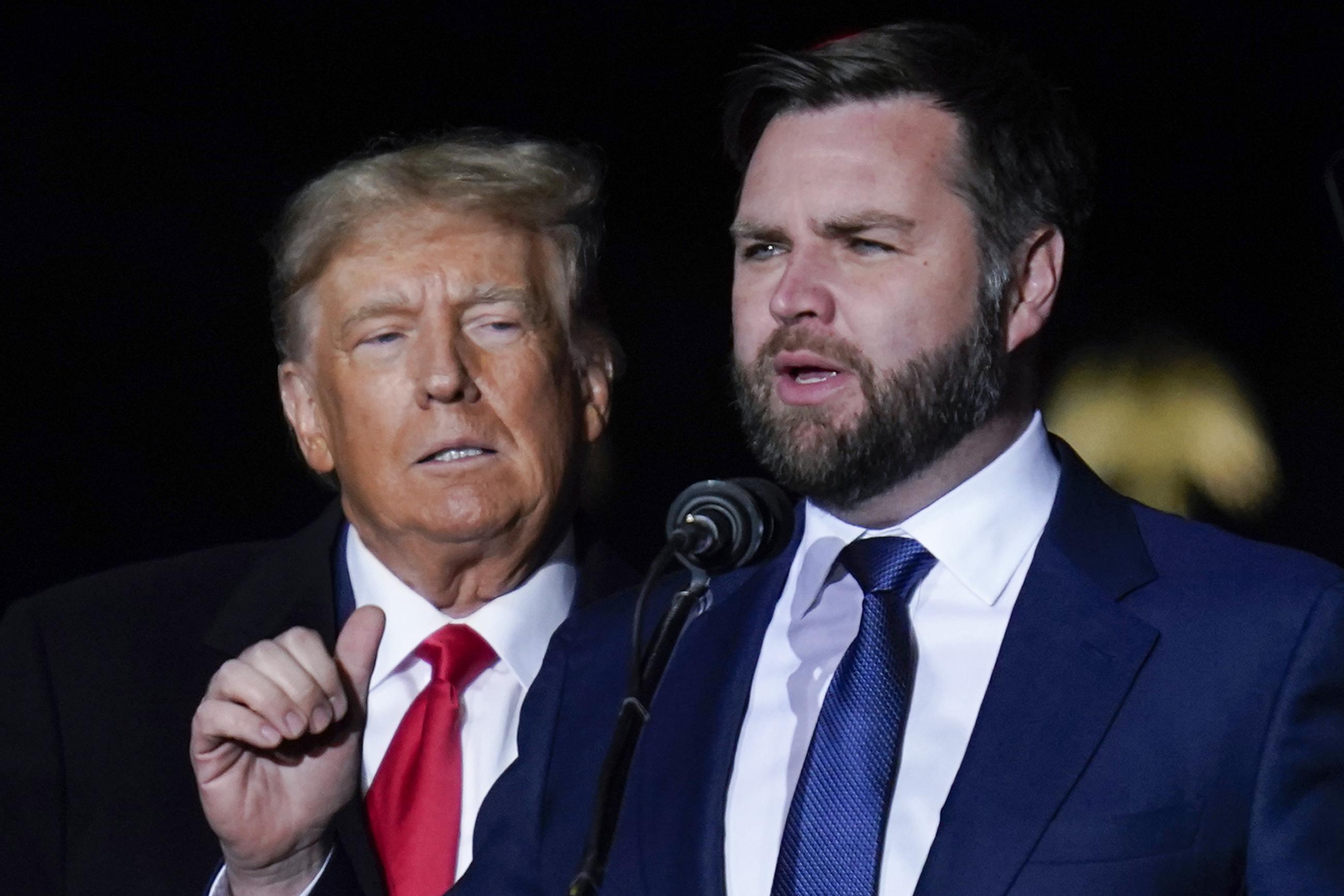 FILE - Sen. J.D. Vance with former President Trump at a campaign rally in Vandalia, Ohio, in 2022 (AP Photo/Michael Conroy, File)