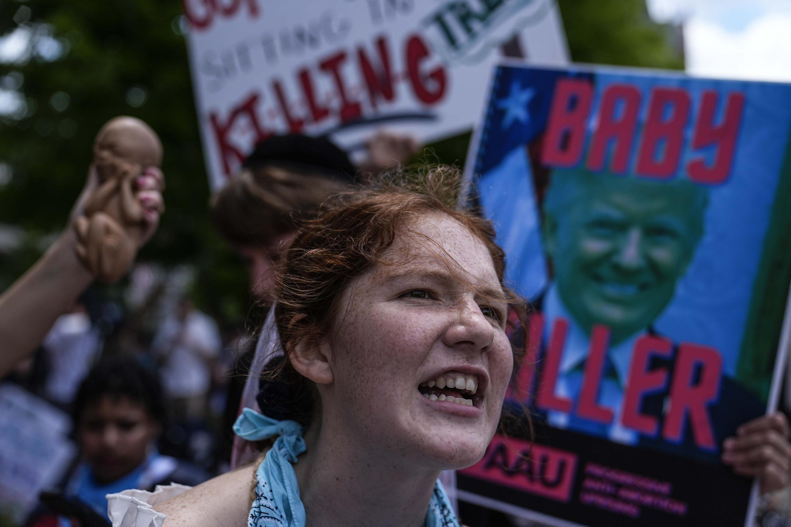 Sarah Carter, who opposes abortion, speaks near the Fiserv Forum during the first day of the 2024 Republican National Convention Monday in Milwaukee. (AP Photo/Jae C. Hong)