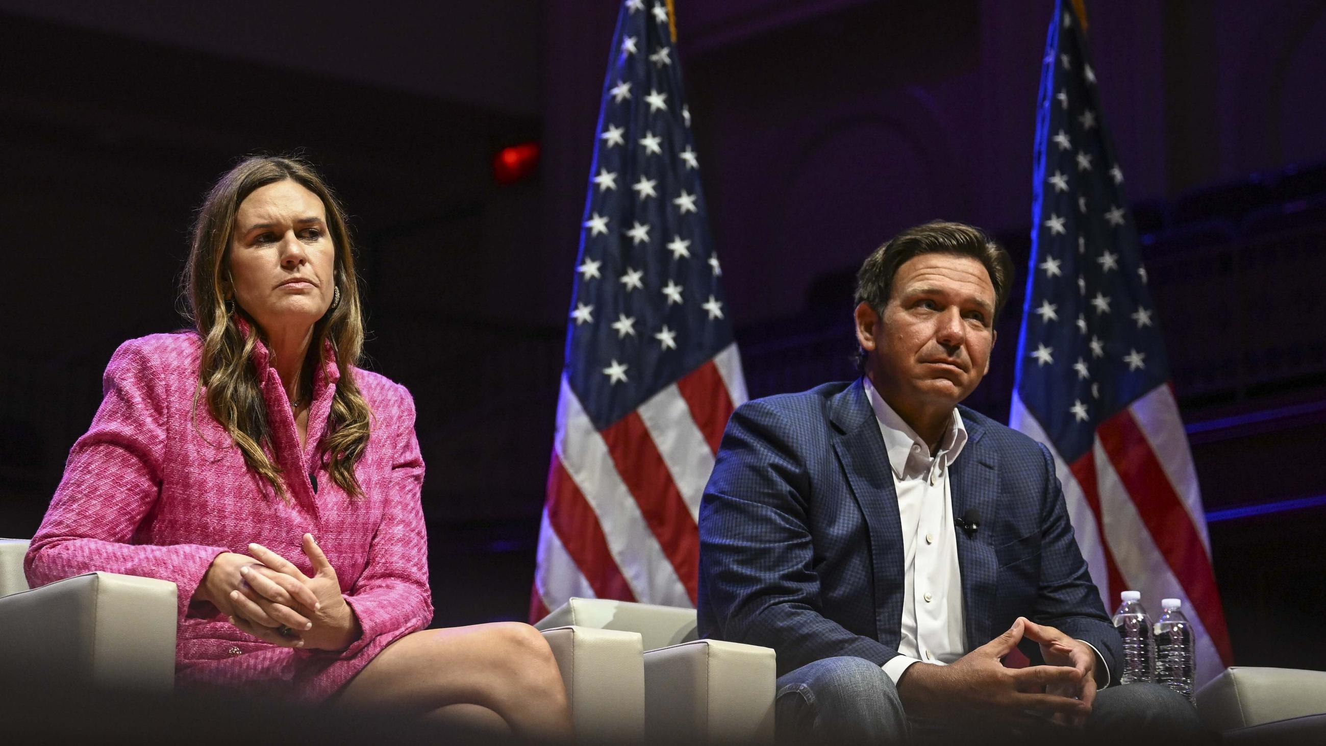 Arkansas Gov. Sarah Huckabee Sanders and Florida Gov. Ron DeSantis take questions during a Moms for Liberty function during the second day of the 2024 Republican National Convention in Milwaukee. (AP Photo/Joe Lamberti)