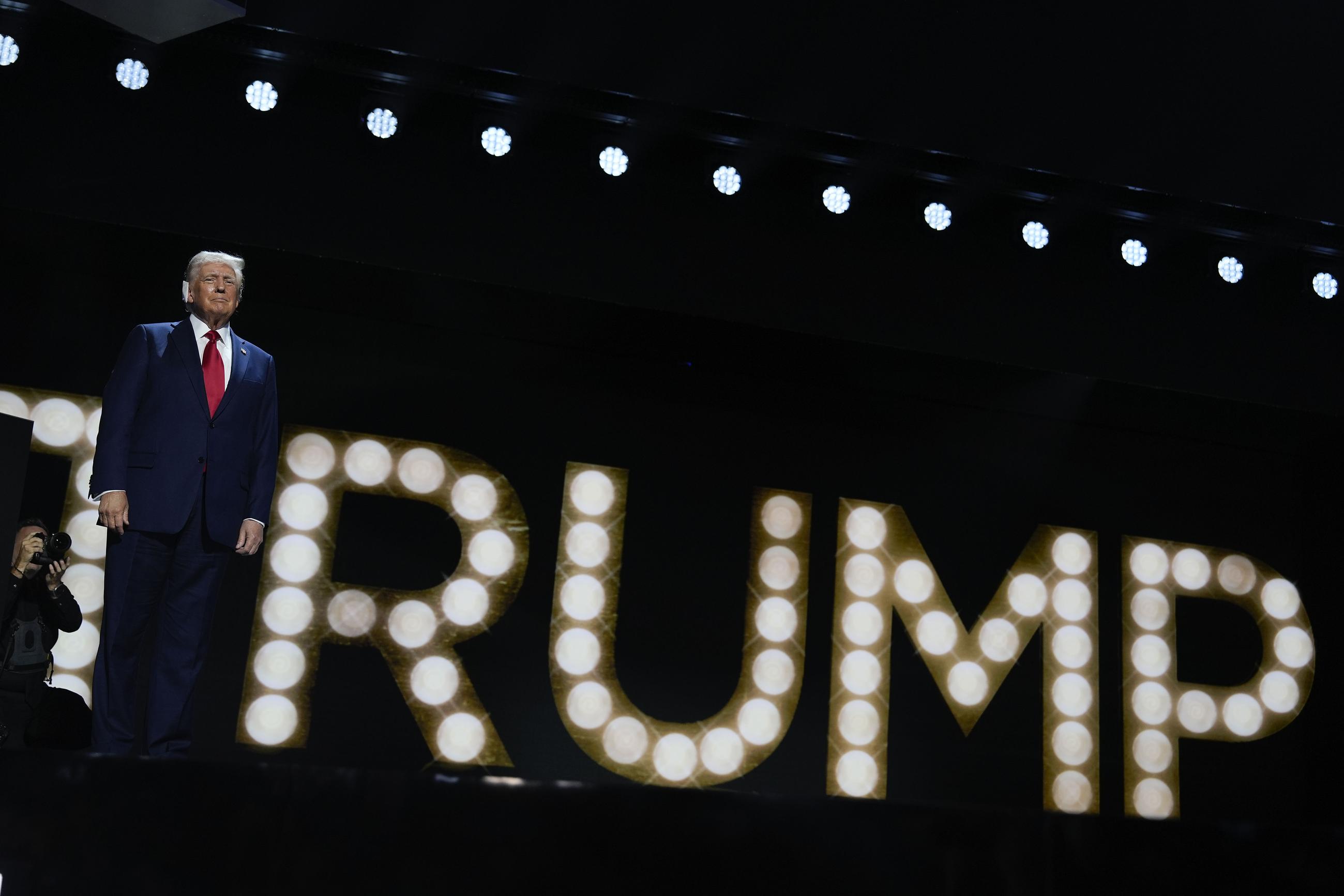 Former President Trump arrives to speak at the Republican National Convention in Milwaukee on Thursday. (AP Photo/Julia Nikhinson)