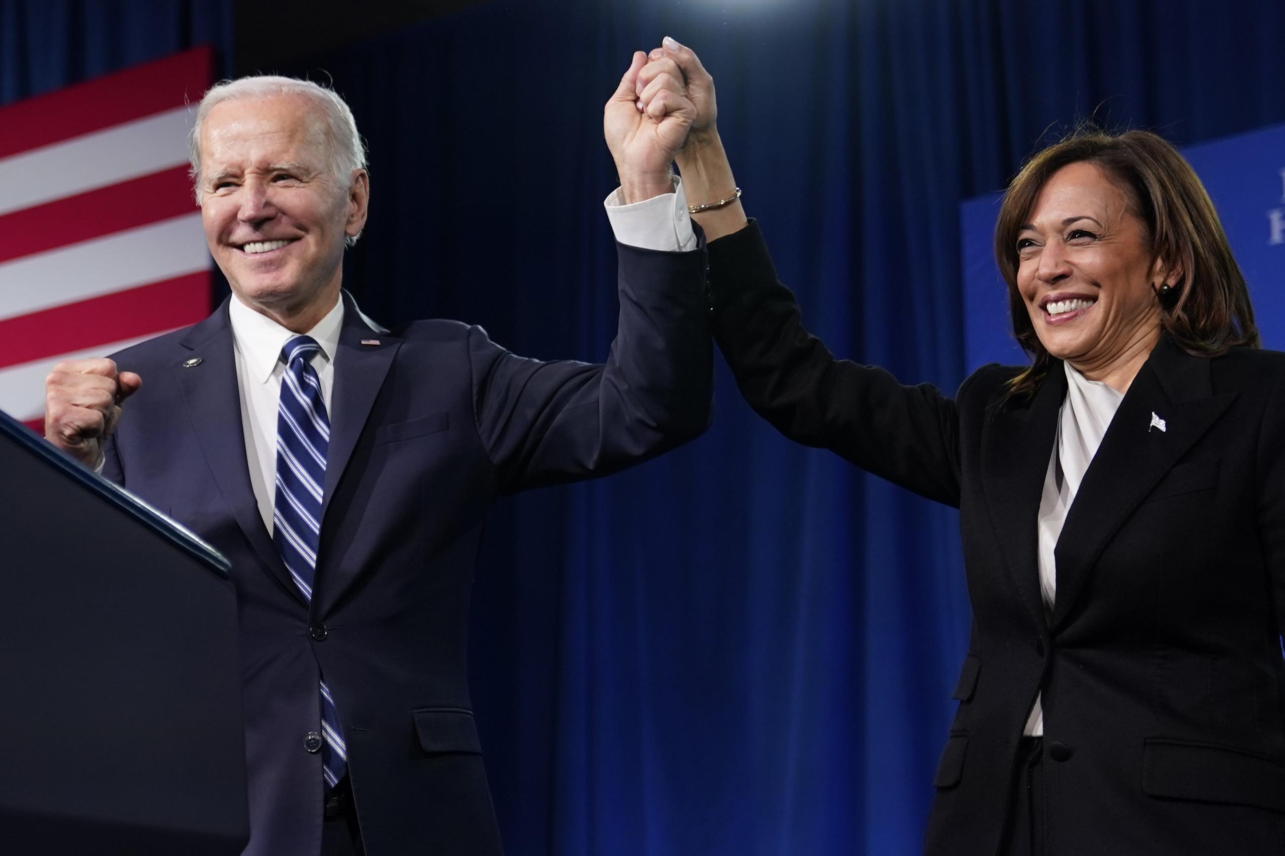 President Biden, left, and Vice President Kamala Harris stand on stage at the Democratic National Committee winter meeting in Philadelphia in 2023. (AP Photo/Patrick Semansky, File)