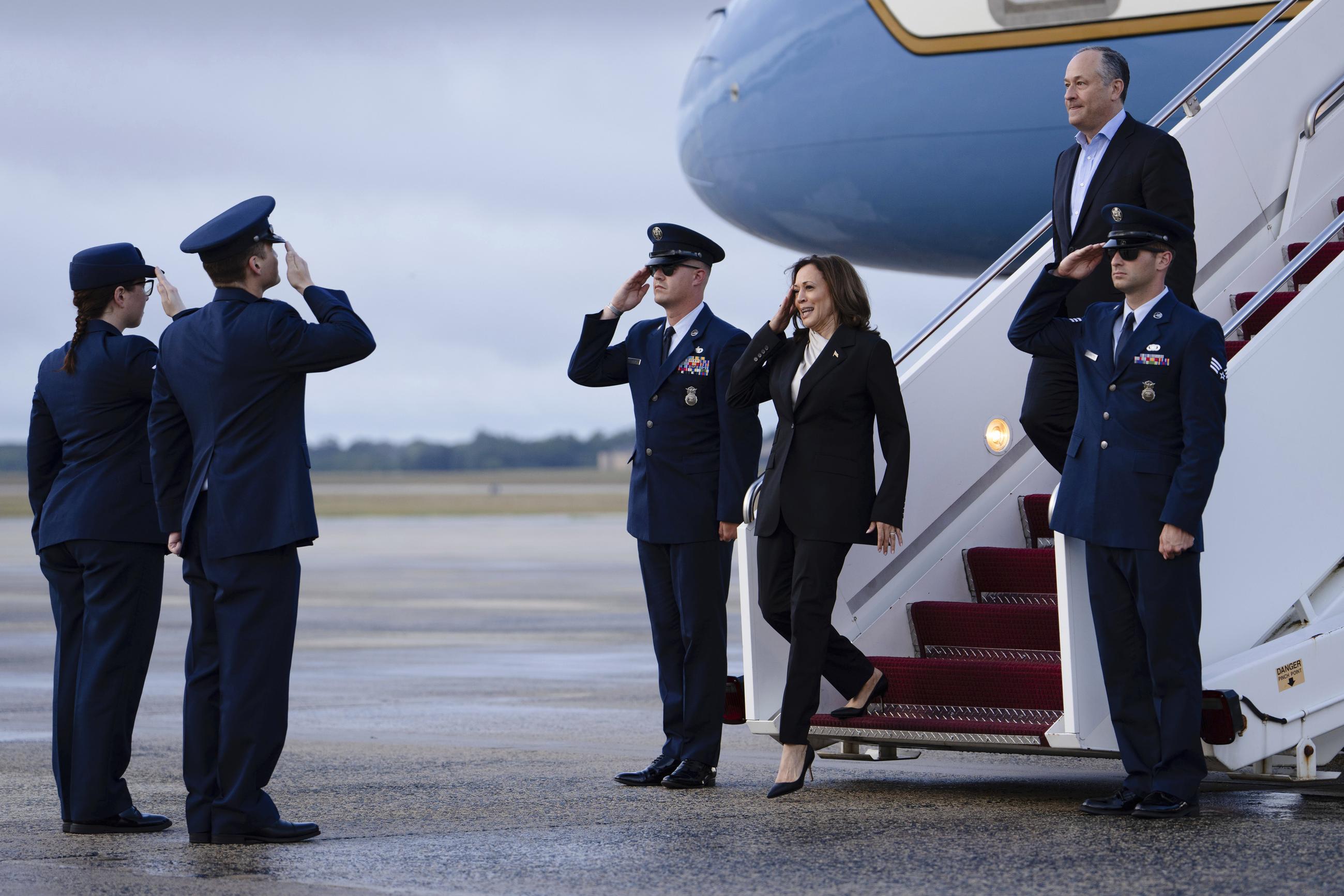 Vice President Kamala Harris and second gentleman Doug Emhoff descend from Air Force Two at Andrews Air Force Base, Maryland, Monday, July 22, 2024. (Erin Schaff/The New York Times via AP, Pool)