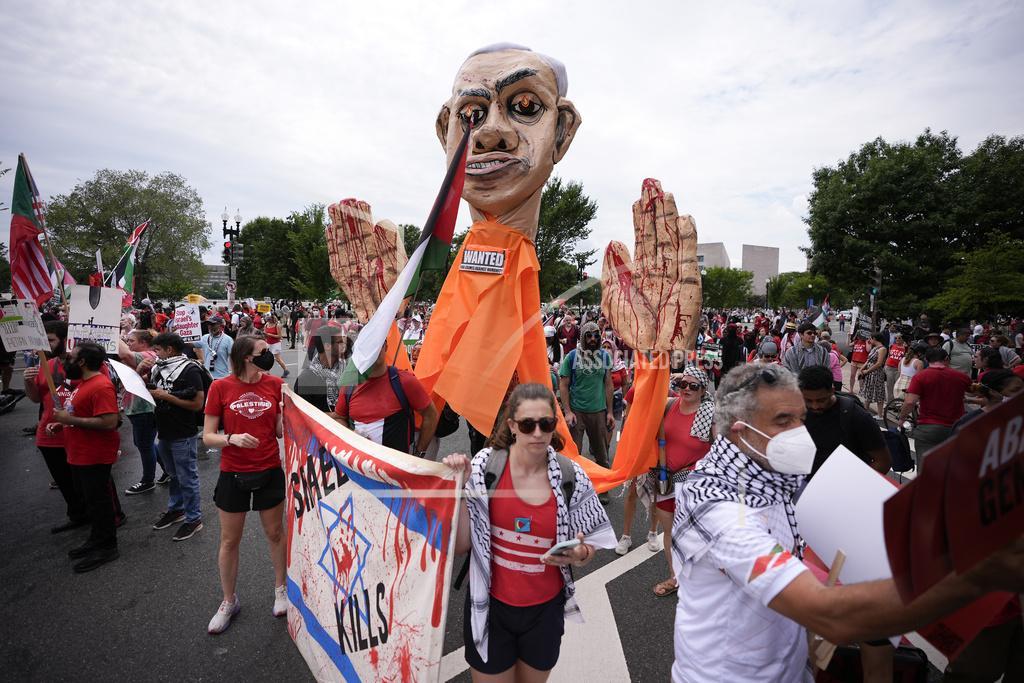 Demonstrators marching near the National Mall during a visit by Israeli Prime Minister Benjamin Netanyahu to the US Capitol on Wednesday (AP Photo/Matt Slocum)