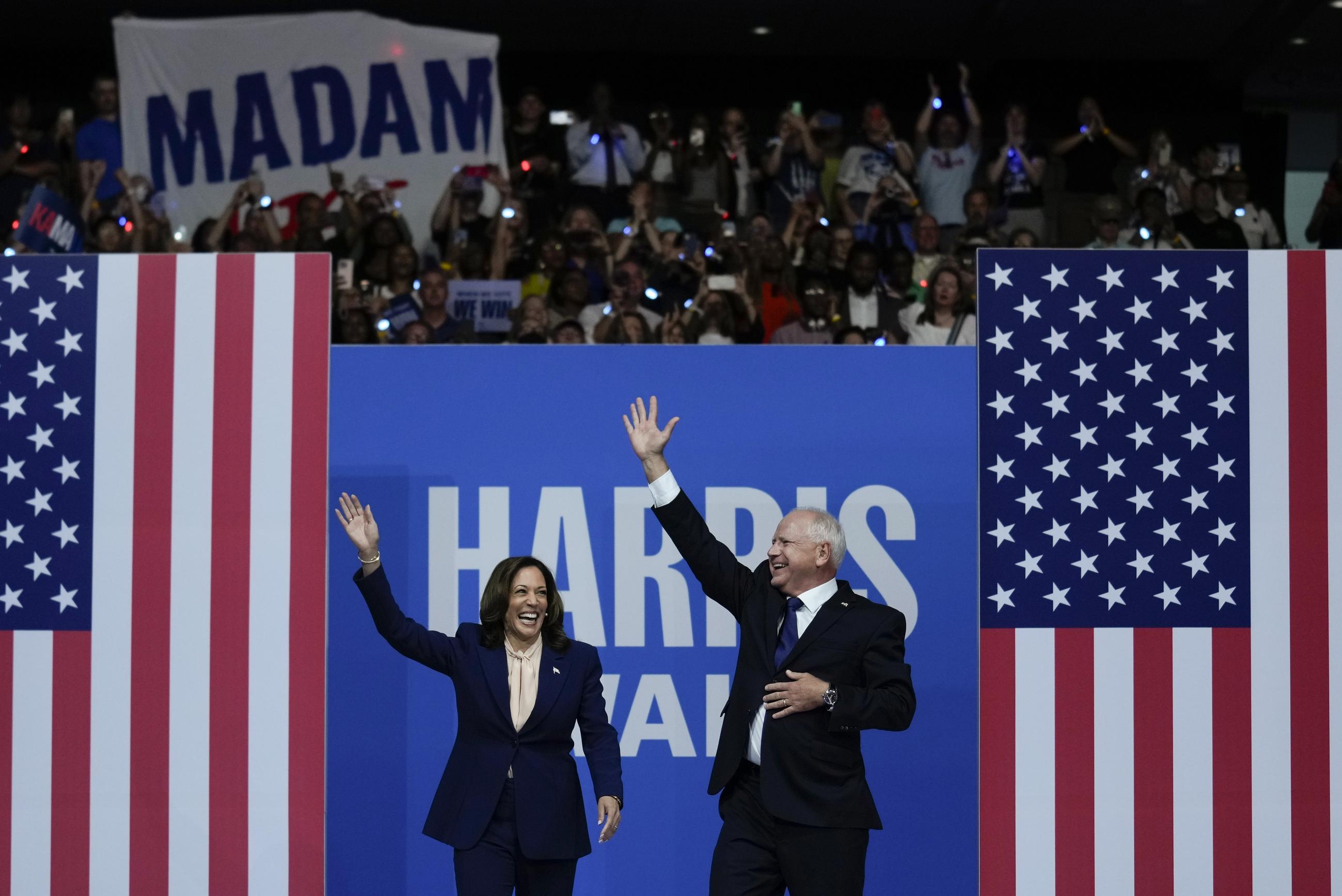 Democratic presidential nominee Vice President Kamala Harris and her running mate Minnesota Gov. Tim Walz arrive at a campaign rally in Philadelphia Tuesday. (AP Photo/Matt Rourke)