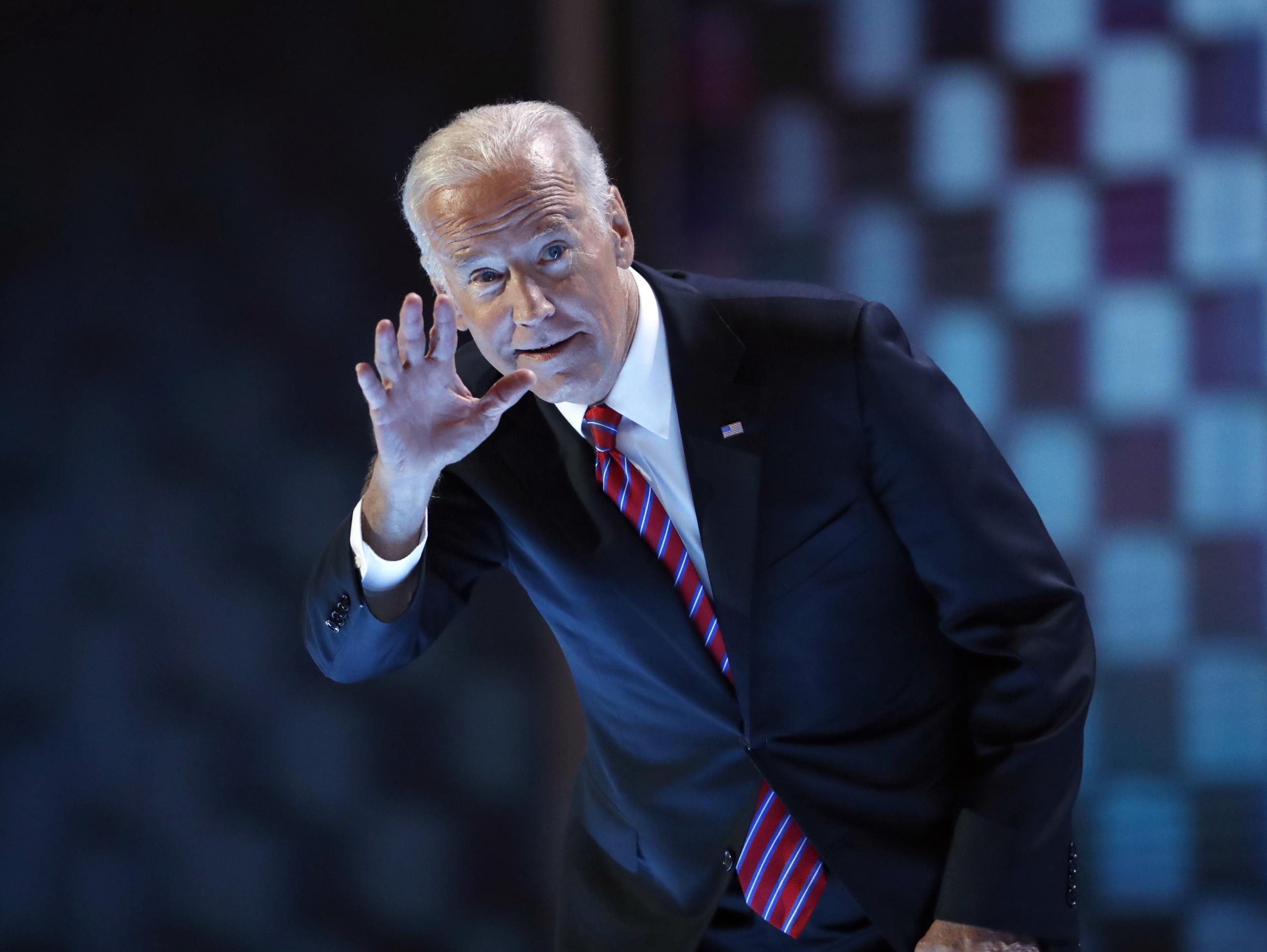 Then-Vice President Joe Biden waves before speaking at the 2016 Democratic National Convention in Philadelphia. (AP Photo/Paul Sancya)