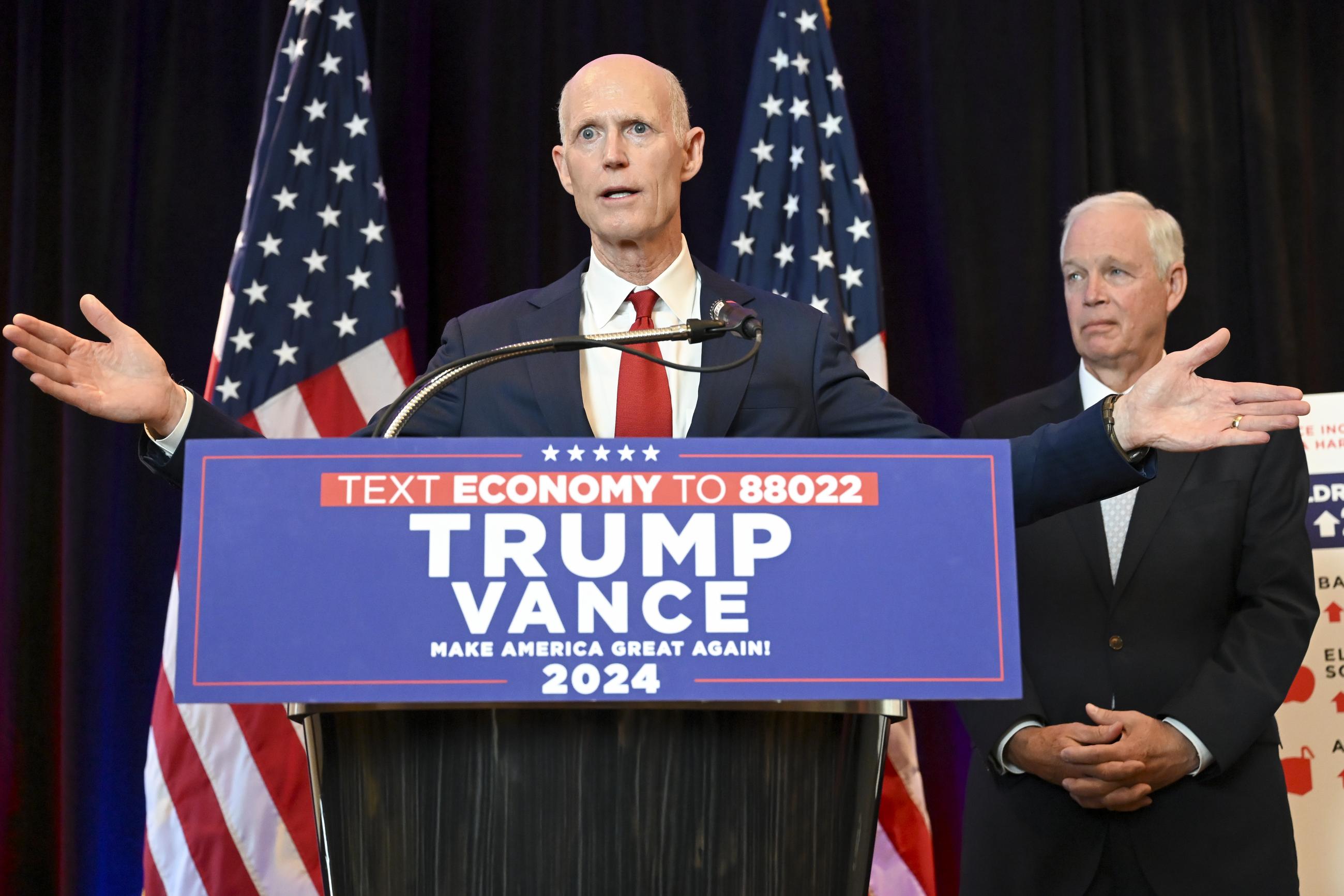 Republican Sens. Rick Scott and Ron Johnson at a news conference in Chicago on Monday (AP Photo/Noah Berger)