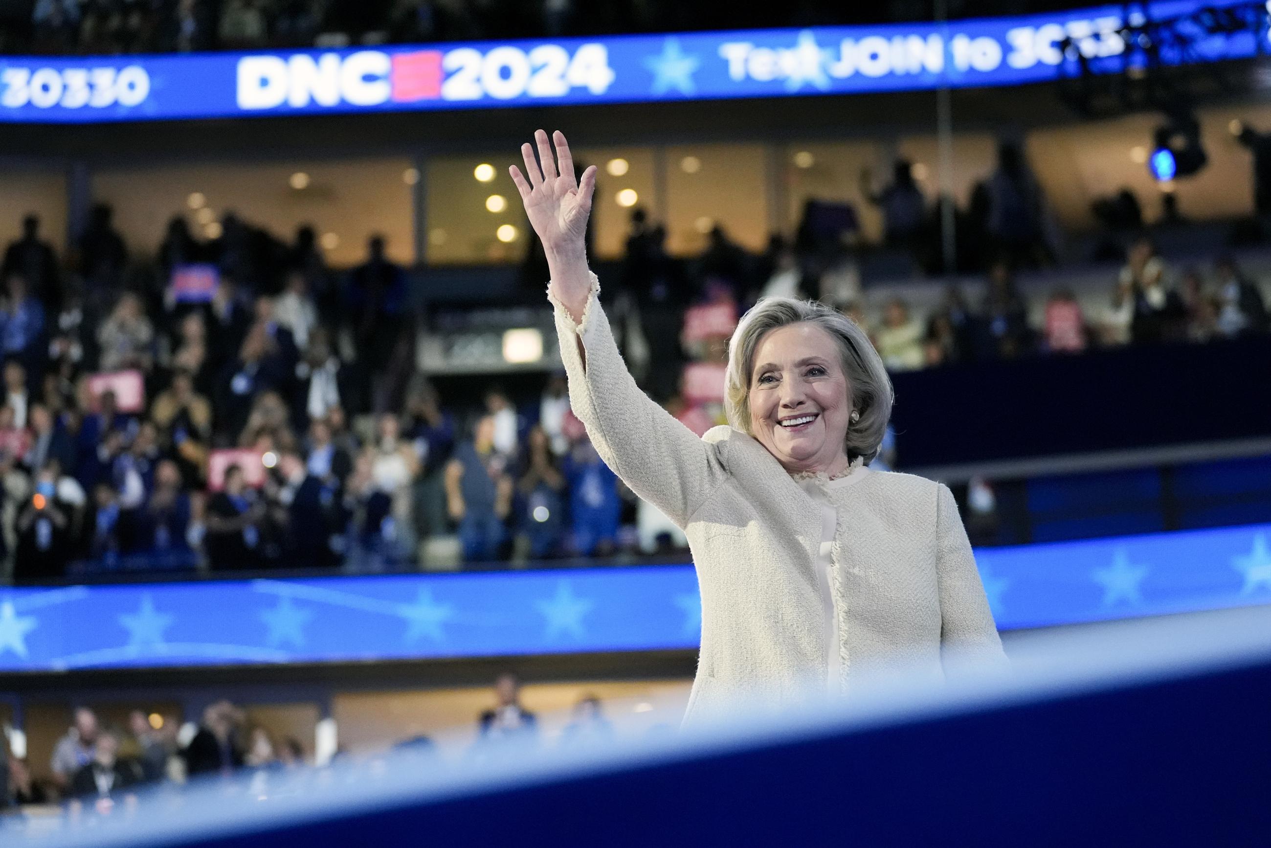 Former Secretary of State Hillary Rodham Clinton arrives on stage at the Democratic National Convention, Monday, Aug. 19, 2024, in Chicago. (AP Photo/Stephanie Scarbrough)