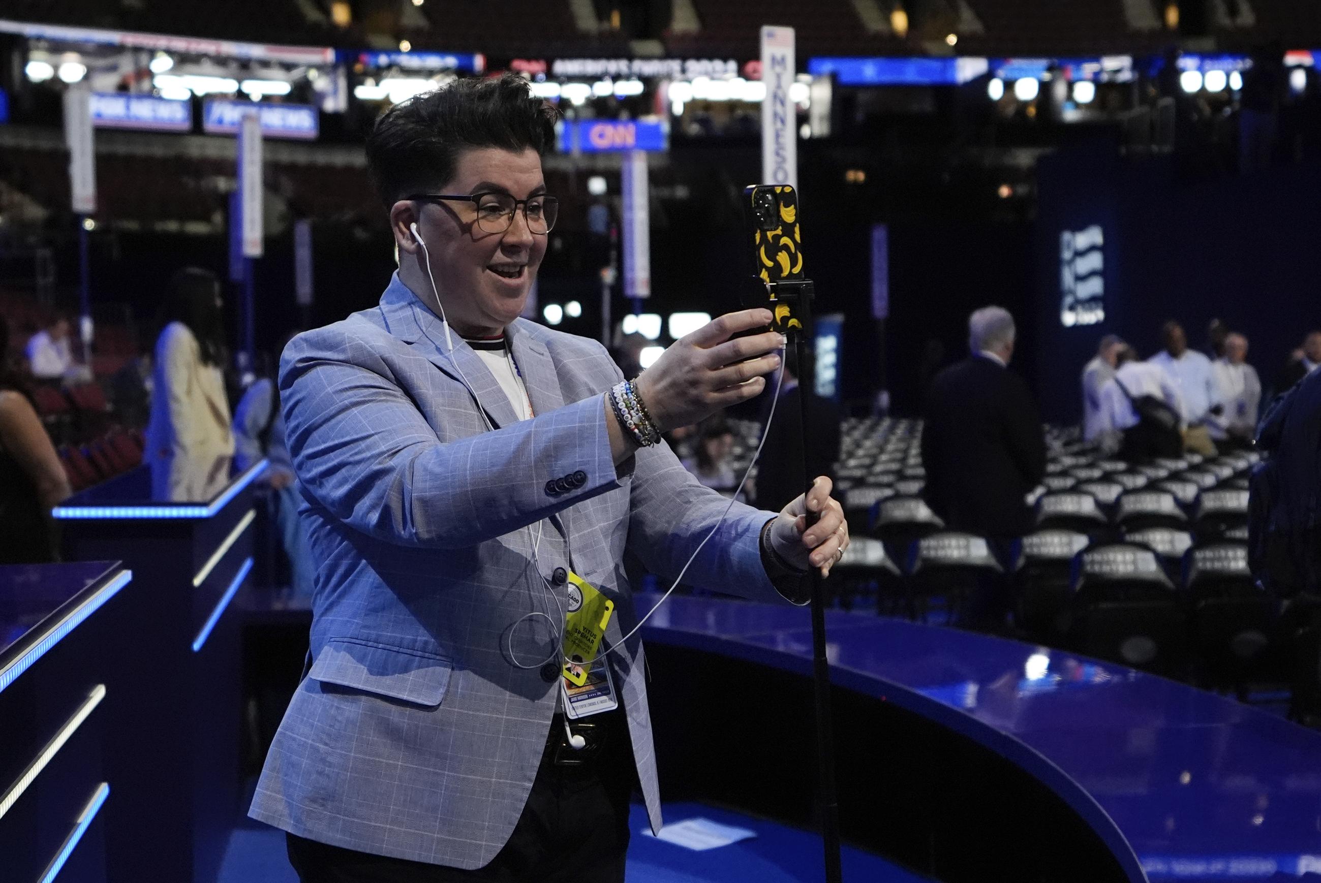 Social media influencer "V" Spehar is seen on the convention floor before the Democratic National Convention on Monday (AP Photo/Brynn Anderson)