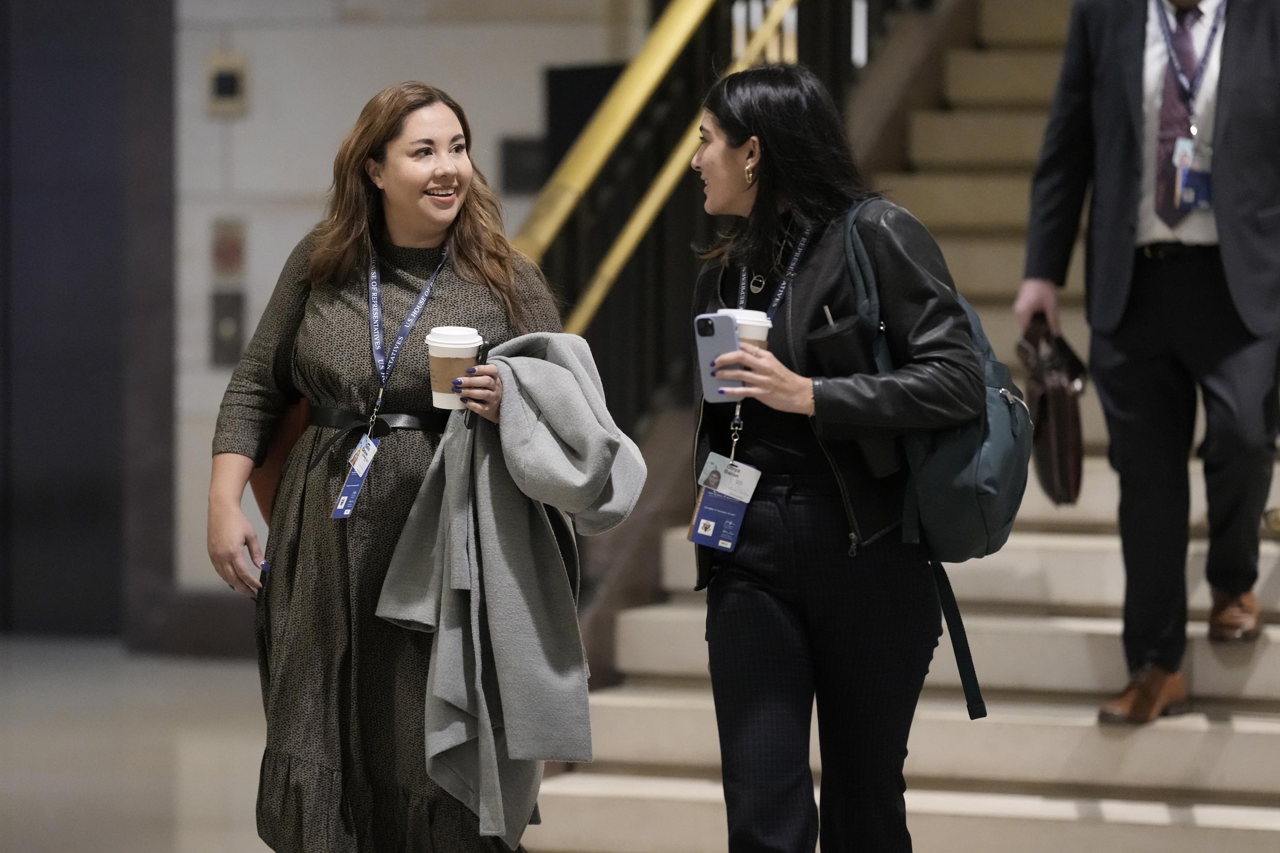 Yadira Caraveo, Democratic candidate in Colorado's 8th Congressional District, left, smiles as she arrives on Capitol Hill, in Washington, Monday, Nov. 14, 2022. (AP Photo/J. Scott Applewhite)
