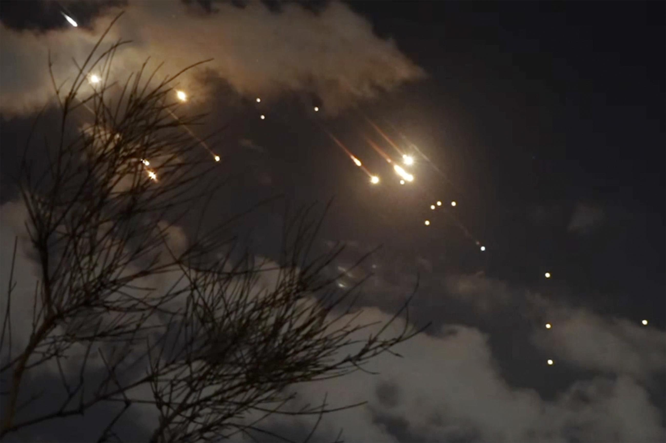 This image taken from video shows projectiles being intercepted over Jerusalem on Tuesday.