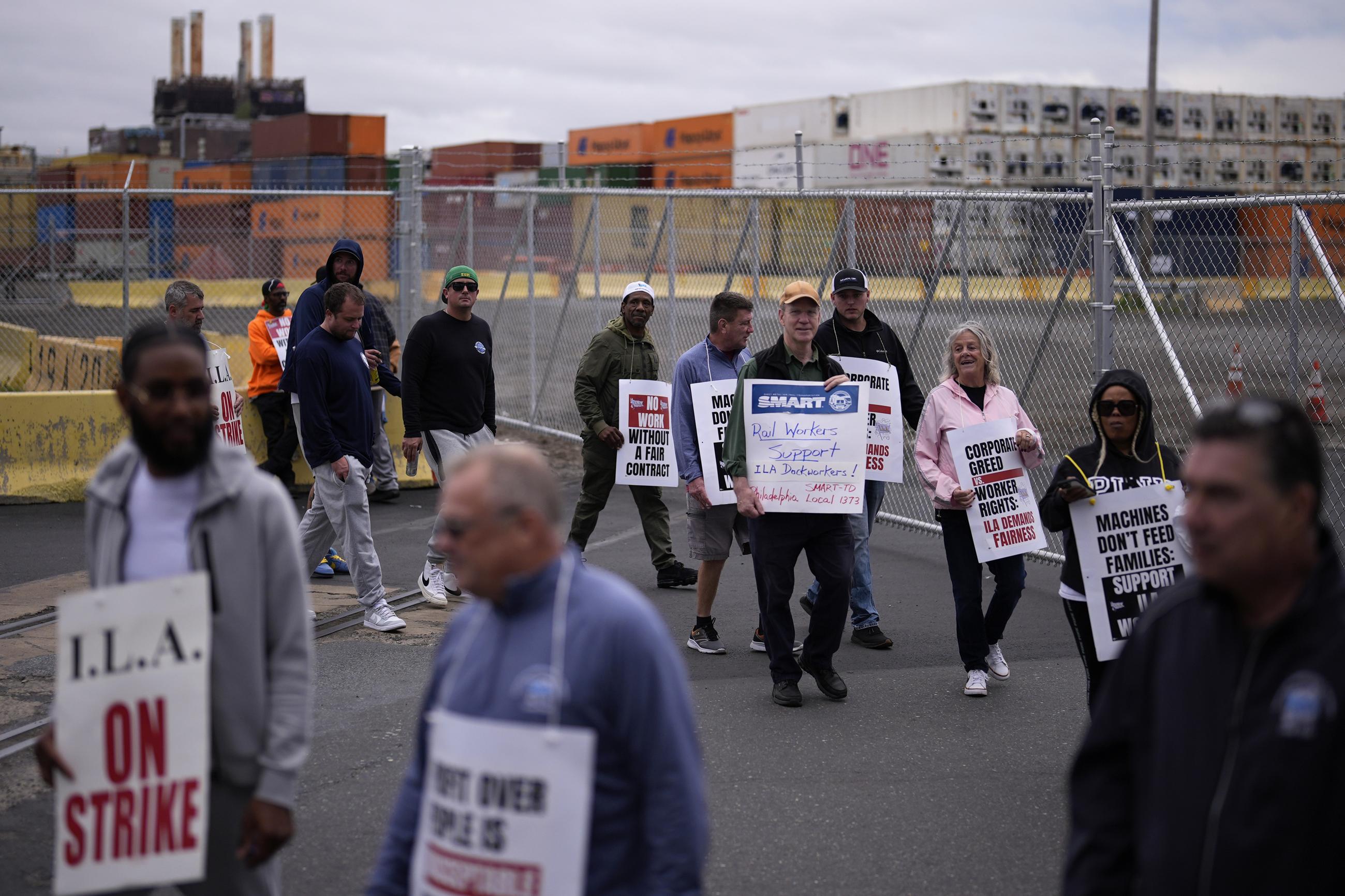 Striking longshoreman picket outside the Packer Avenue Marine Terminal Port in Philadelphia on Tuesday. (AP Photo/Matt Slocum)
