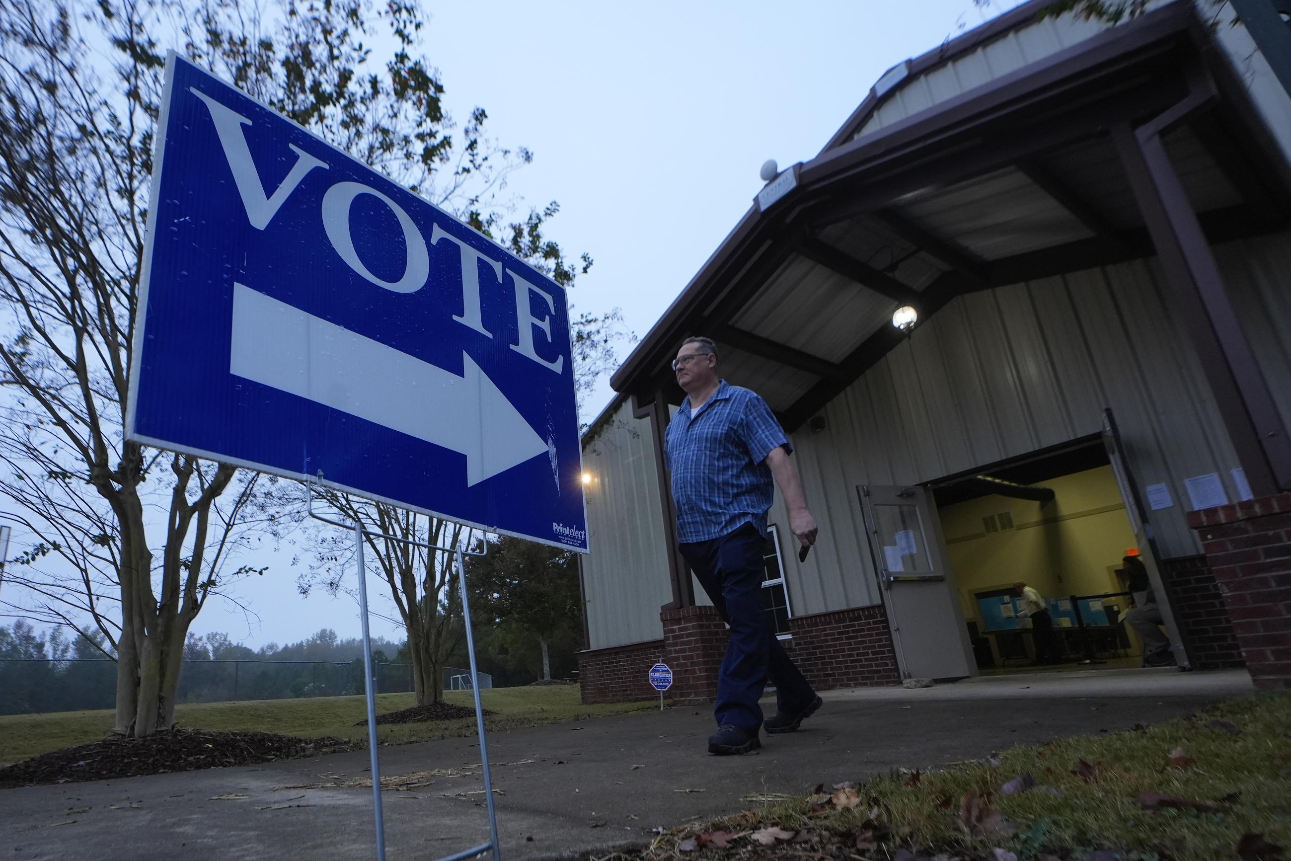 A voter leaves a polling location after voting Tuesday, Nov. 5, 2024 in Rutledge, Ga. (AP Photo/John Bazemore