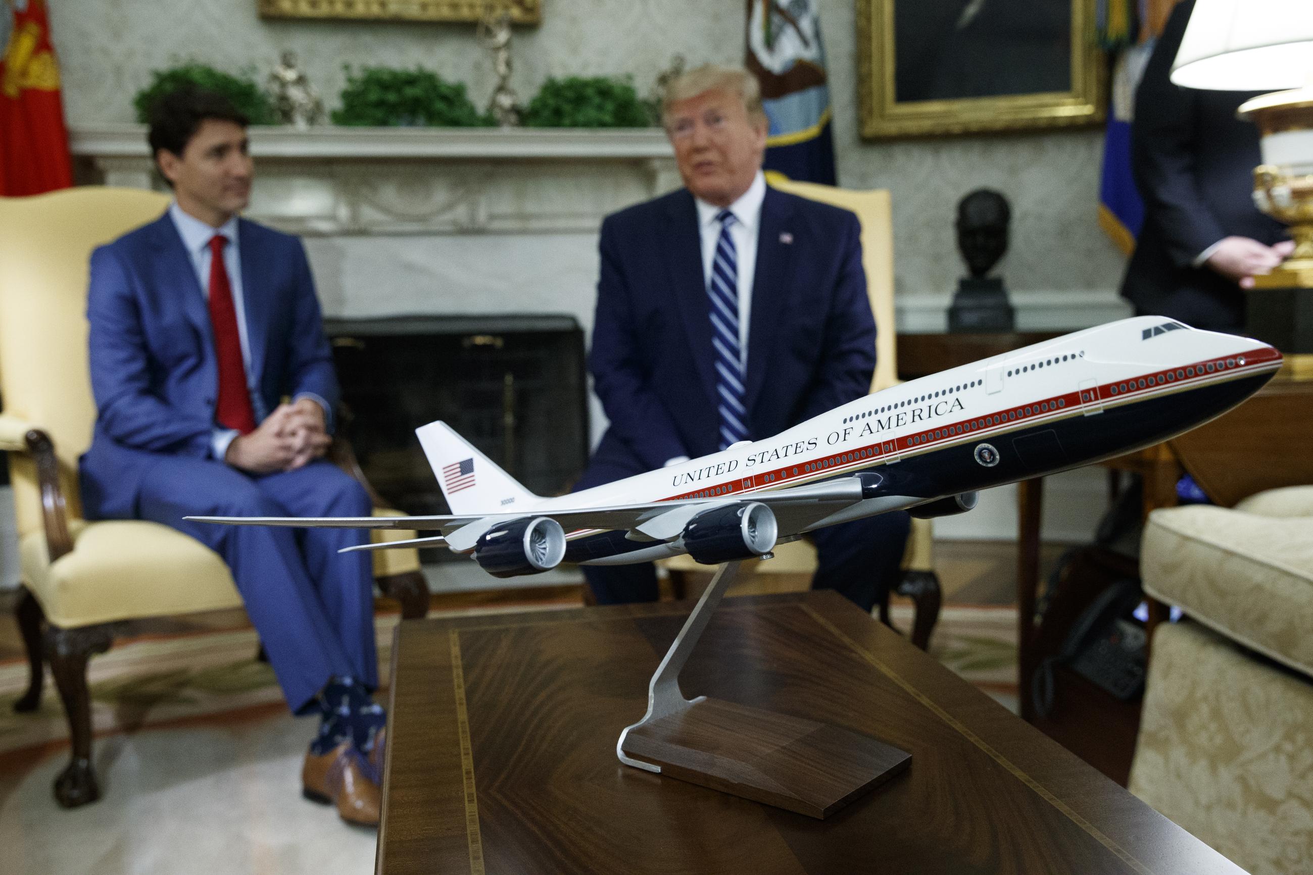 A model of a new Air Force One design sits on a table during a meeting between Donald Trump and Canadian Prime Minister Justin Trudeau in the Oval Office in 2019. (AP Photo/Evan Vucci)