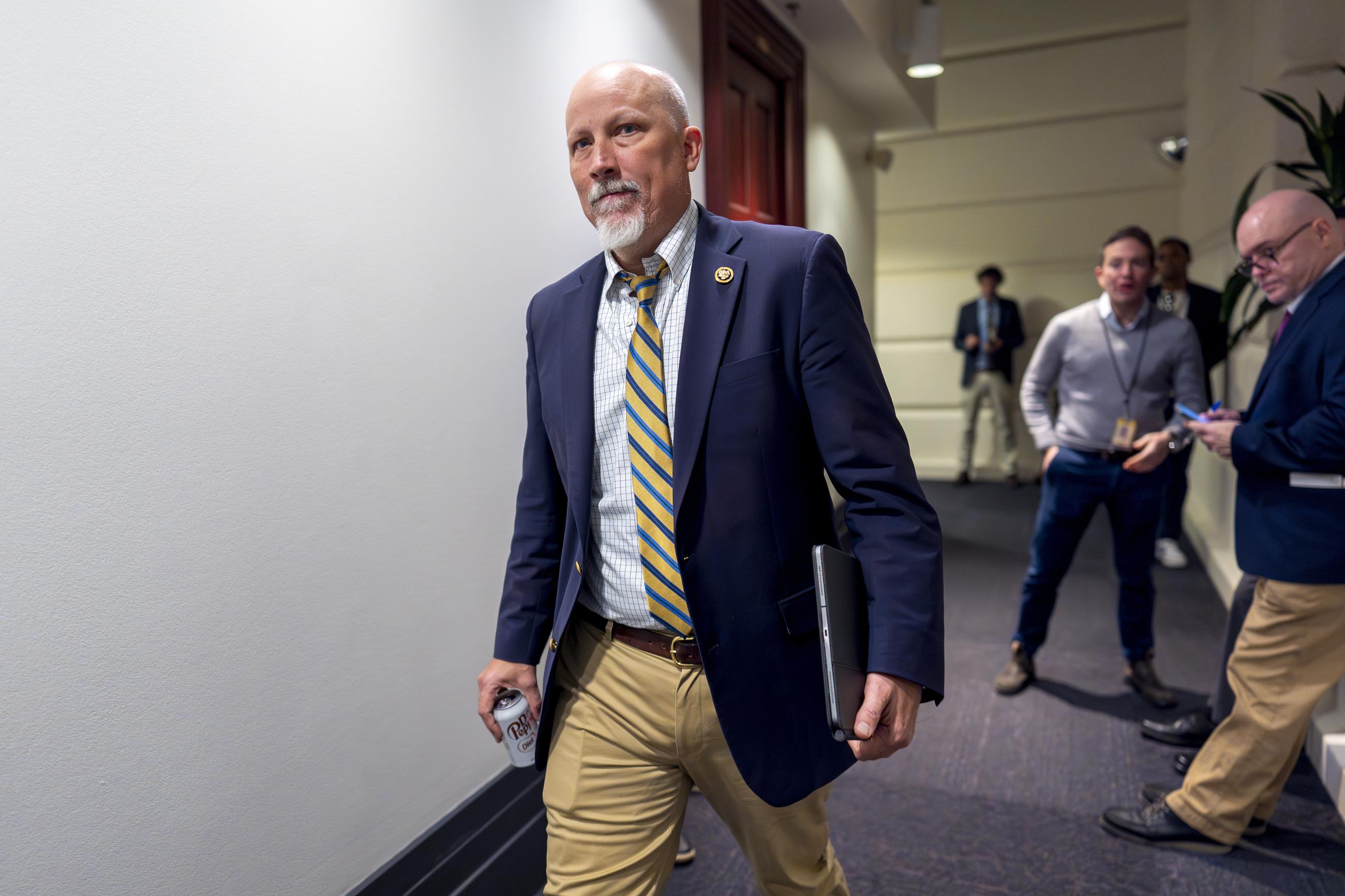Rep. Chip Roy leaves a Republican meeting with House Speaker Mike Johnson on Friday. (AP Photo/J. Scott Applewhite)
