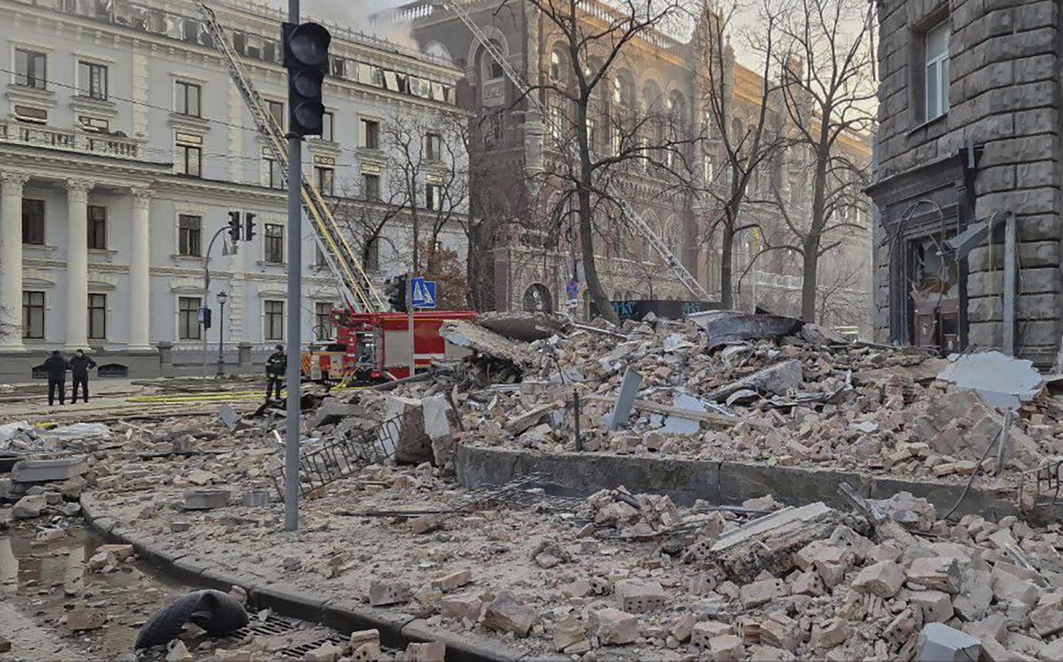 A view of debris on a street from nearby buildings, hundreds of meters from Ukraine's Presidential Office after a Russian drone attack in Kyiv, Ukraine, Wednesday. (AP Photo/Oksana Johannesson)