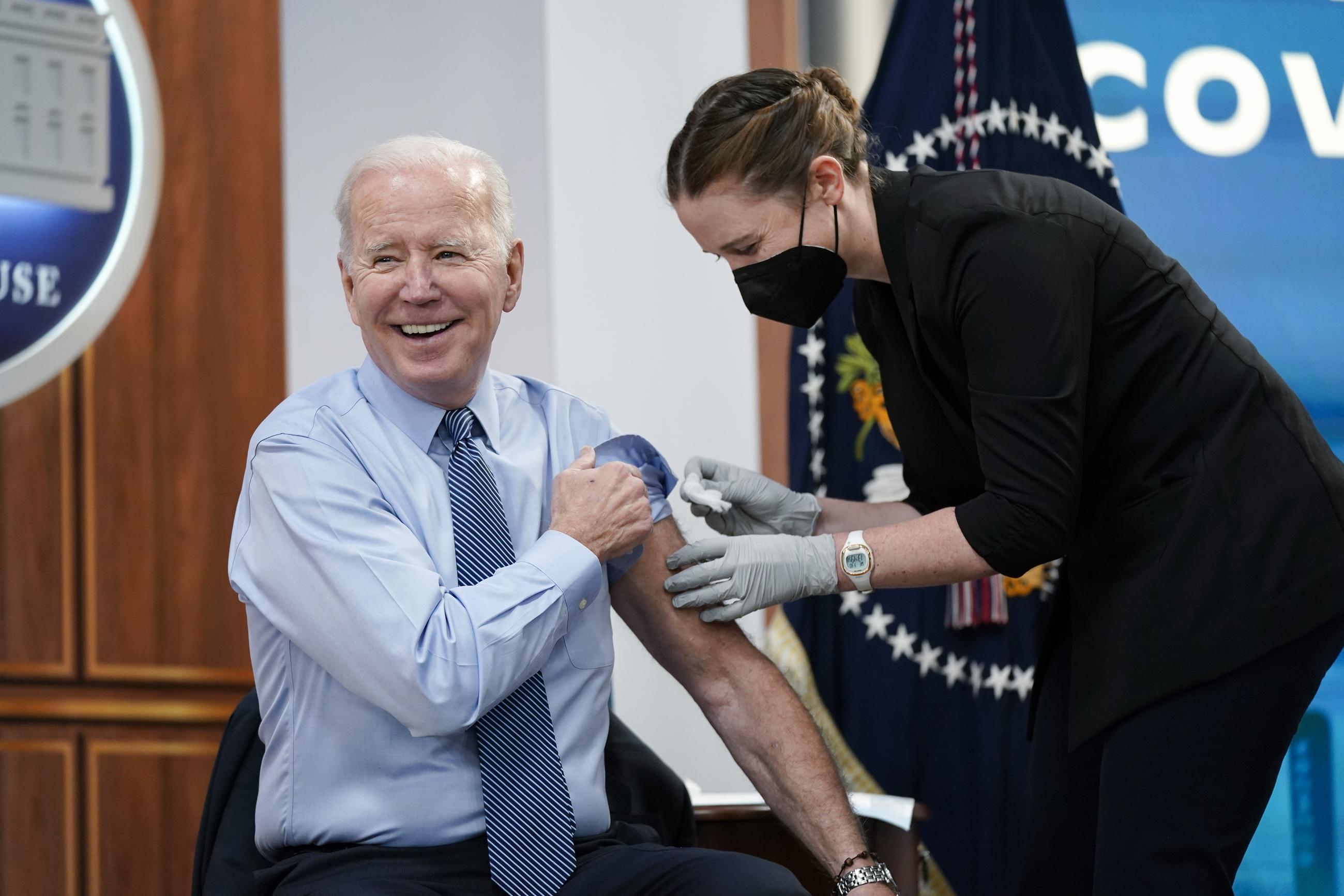 Biden receiving his second COVID-19 booster in March 2022