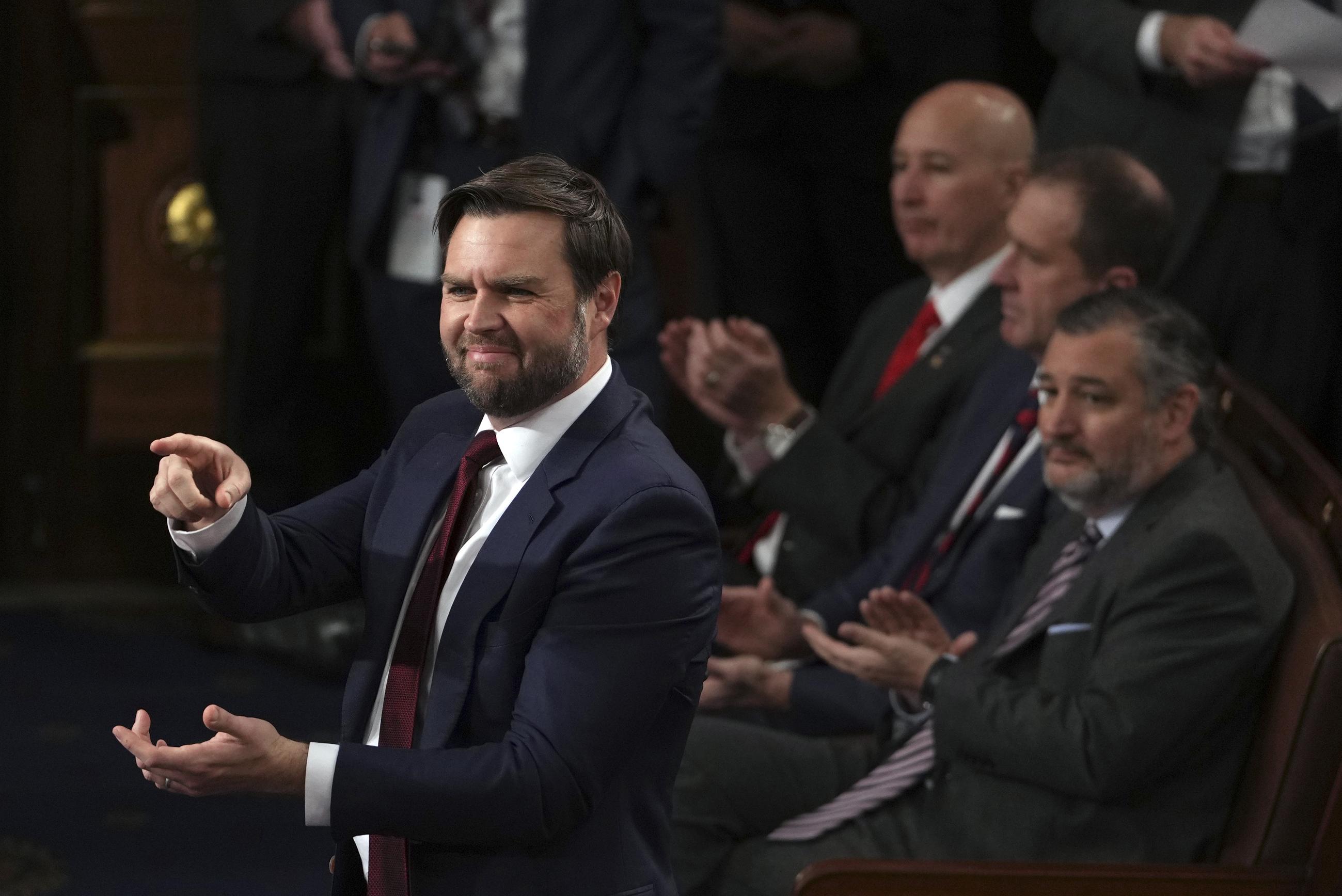 Vice President-elect JD Vance smiles after the certification for Ohio is read during a joint session of Congress to confirm the Electoral College votes, affirming President-elect Donald Trump's victory in the presidential election, Monday, Jan. 6, 2025, at the U.S. Capitol in Washington. (AP Photo/Matt Rourke)