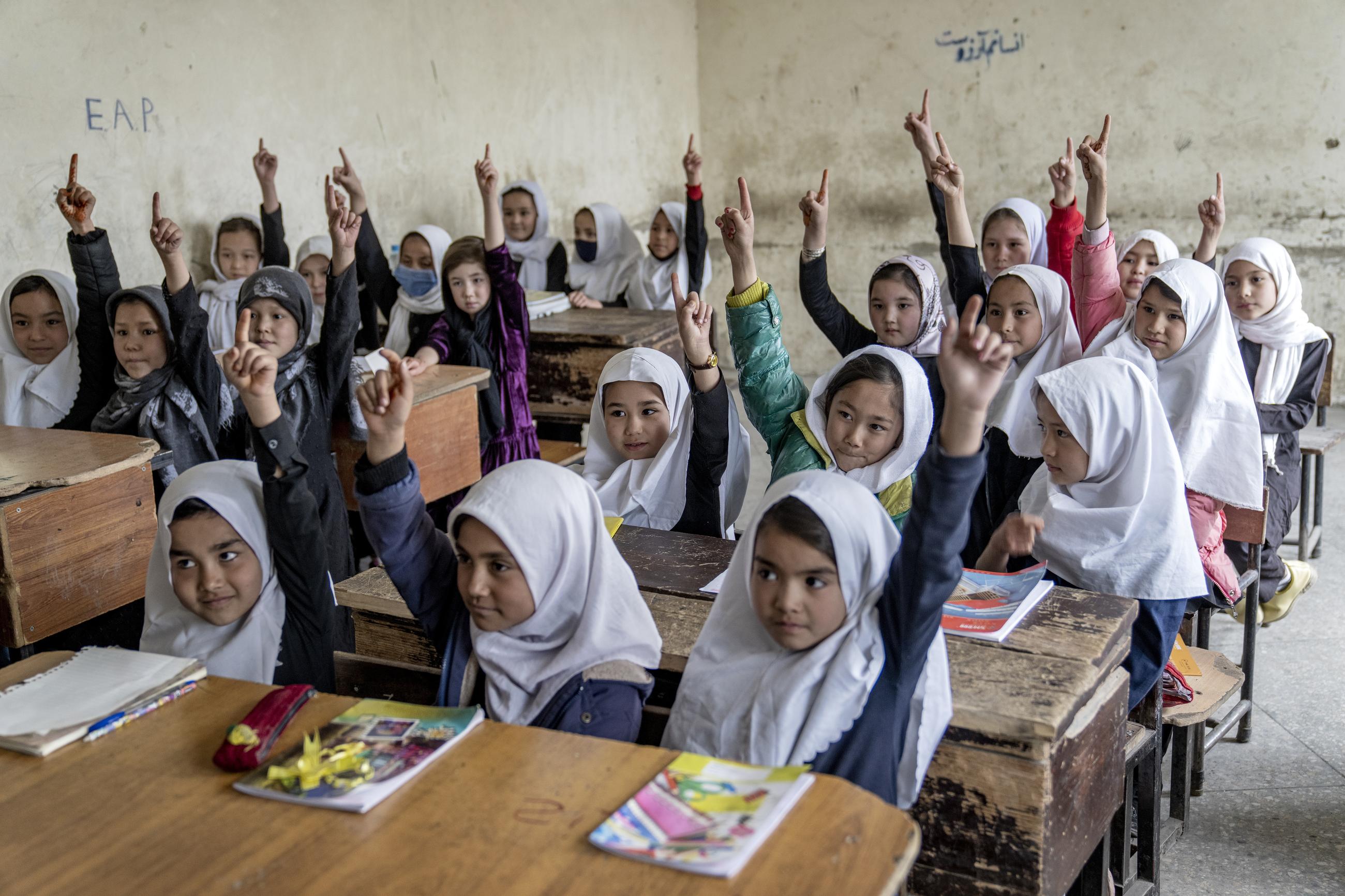 Afghan school girls attend their classroom on the first day of the new school year in Kabul in March 2023. (AP Photo/Ebrahim Noroozi, File, File)