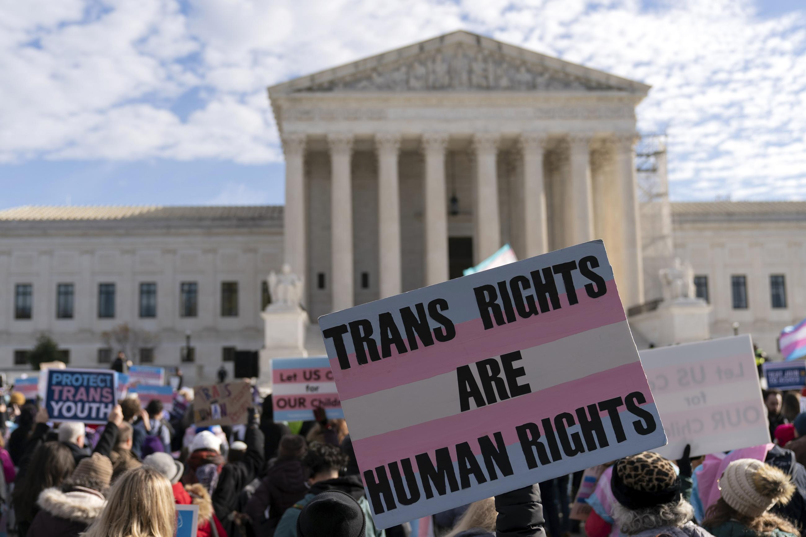 Transgender-rights supporters rally outside of the Supreme Court in December 2024. (AP Photo/Jose Luis Magana, File)