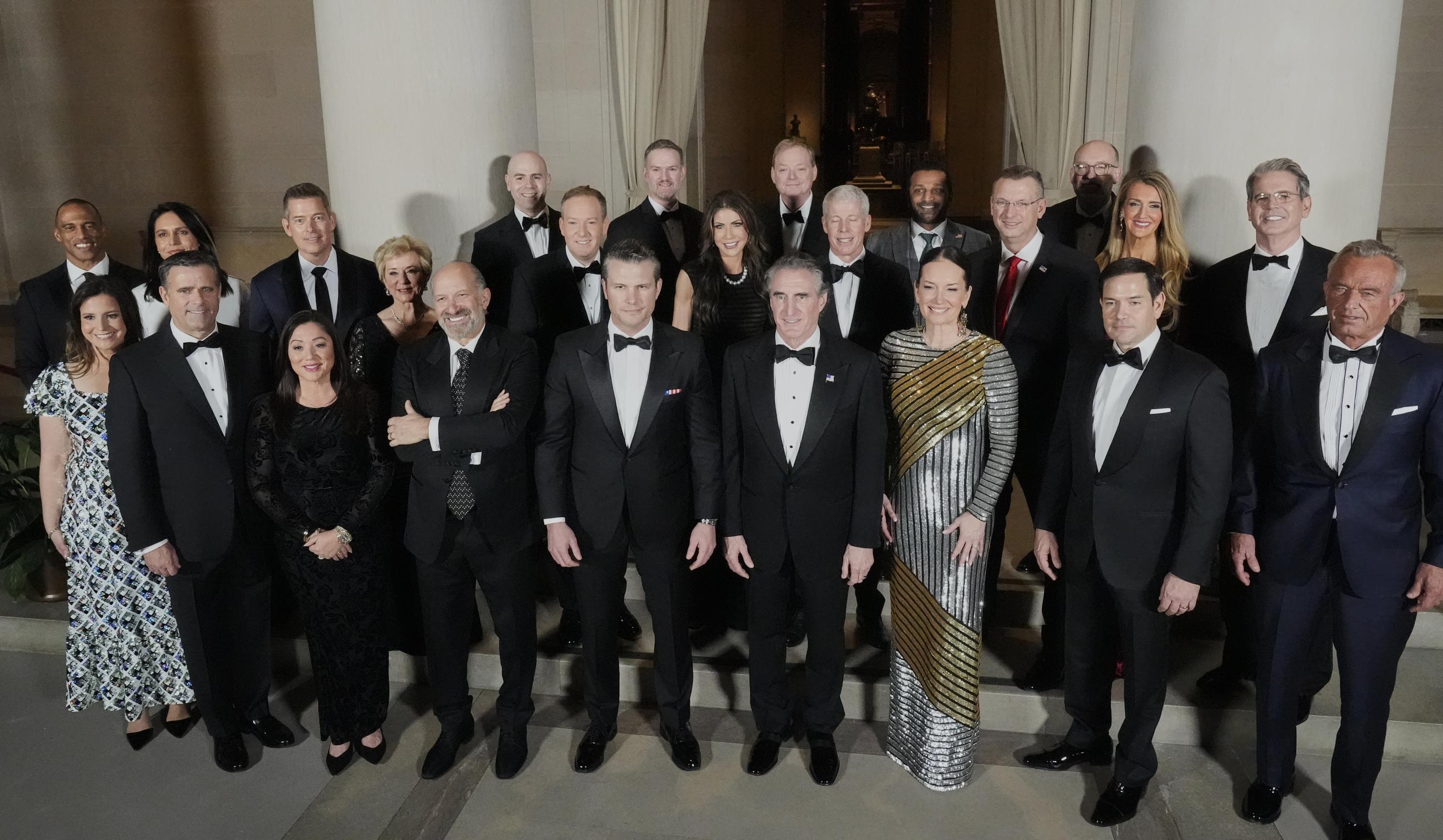 President-elect Donald Trump's Cabinet picks, other nominees and appointments, pose for a photo at the National Gallery of Art in Washington, Saturday, Jan. 18, 2025. First row from left, Elise Stefanik, John Ratcliffe, Lori Chavez-DeRemer, Howard Lutnick, Pete Hegseth, Doug Burgum, Brooke L. Rollins, Marco Rubio and Robert F. Kennedy Jr.; second row from left, Scott Turner, Tulsi Gabbard, Sean Duffy, Linda McMahon, Lee Zeldin, Kristi Noem, Chris Wright, Doug Collins, Kelly Loeffler and Scott Bessent; and third row from left, Stephen Miran, Jamieson Greer, Kevin Hassett, Kash Patel and Russell Vought. (AP Photo/Mark Schiefelbein)