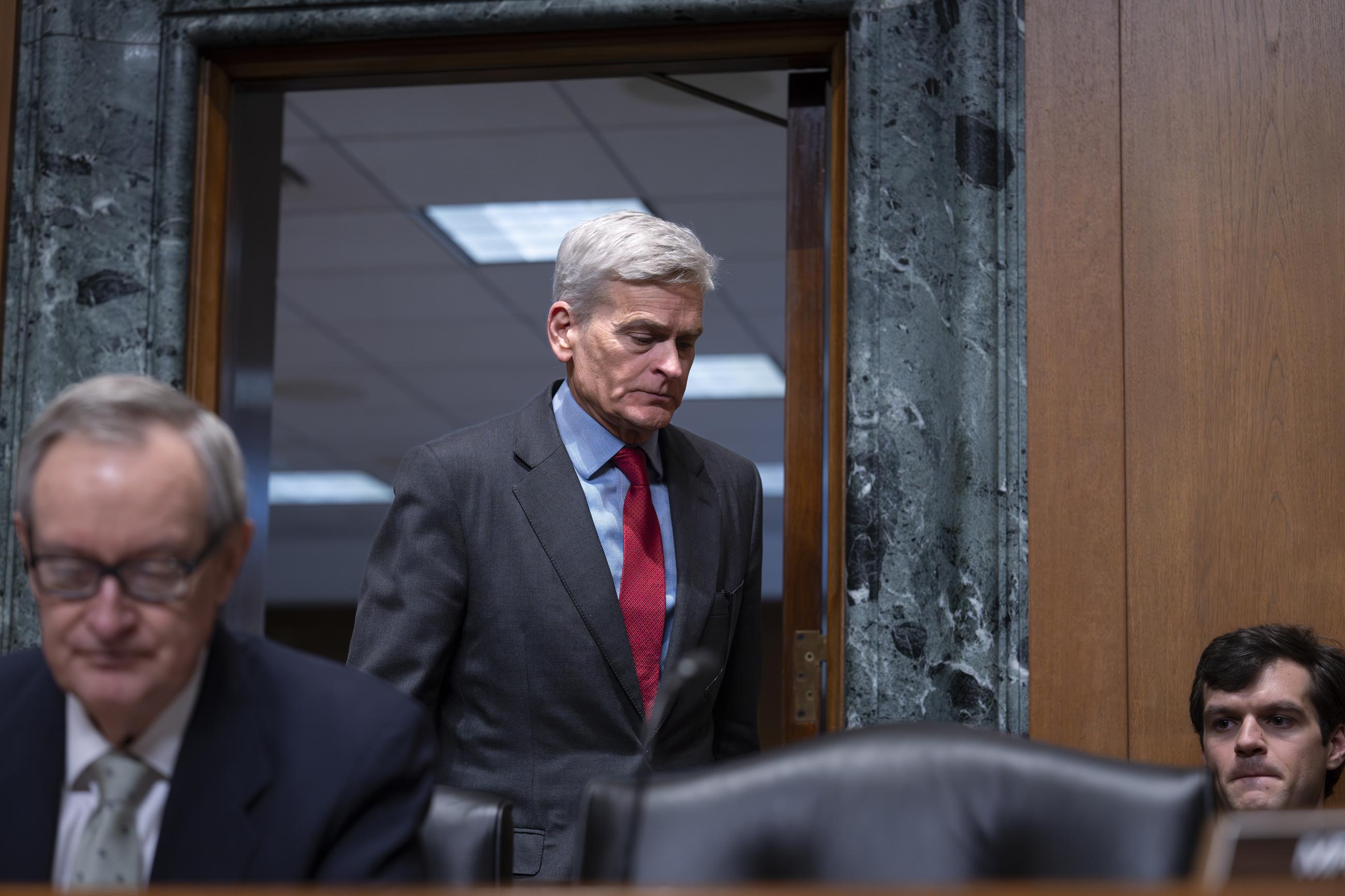 Sen. Bill Cassidy, R-La., returns to the room just before the Senate Finance Committee holds a roll call vote approving the nomination of Robert F. Kennedy Jr. to lead the Health and Human Services Department, on Capitol Hill in Washington, Tuesday, Feb. 4, 2025. (AP Photo/J. Scott Applewhite)