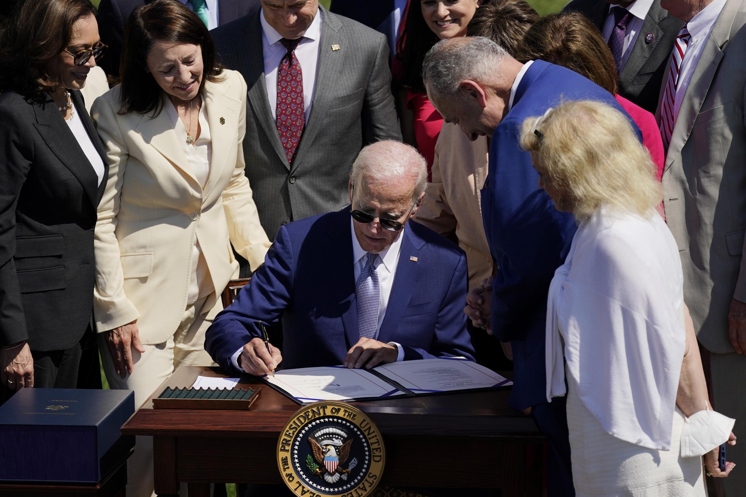 President Biden signing the CHIPS and Science Act into law at the White House in 2022 (AP Photo/Carolyn Kaster, File)