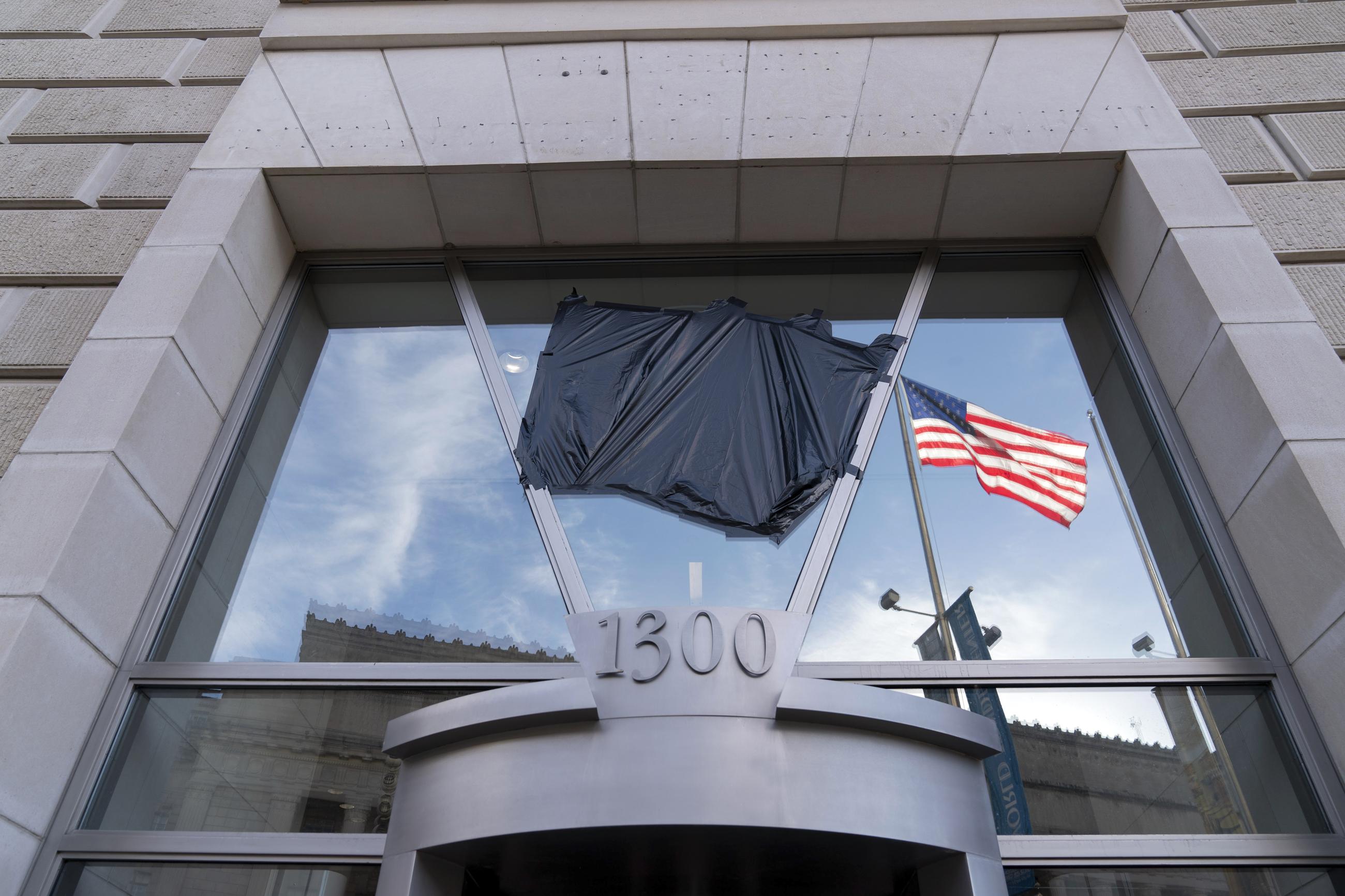 The flag and seal of the U.S. Agency for International Development at its headquarters in Washington have been removed. (AP Photo/Jose Luis Magana)