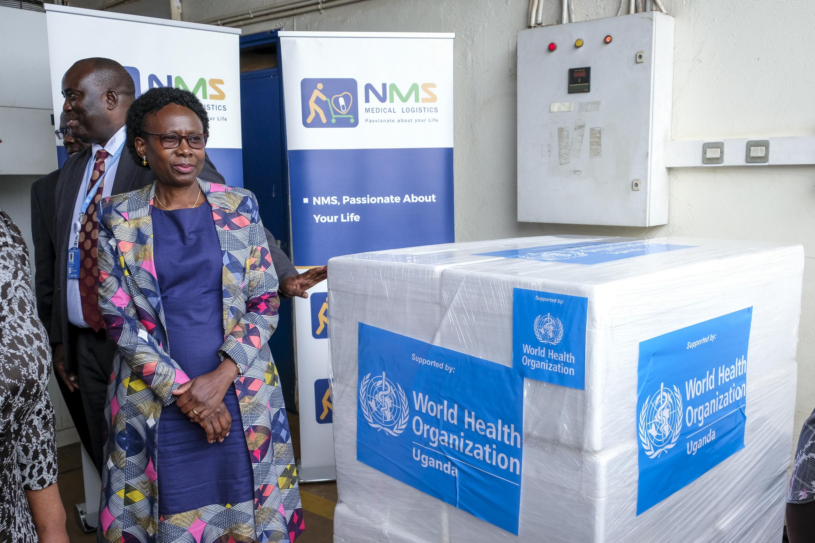 Ugandan Minister of Health Jane Ruth Aceng receives World Health Organization boxes containing one of three candidate vaccines against the Sudan strain of the Ebola virus in 2022. (AP Photo/Hajarah Nalwadda, File)