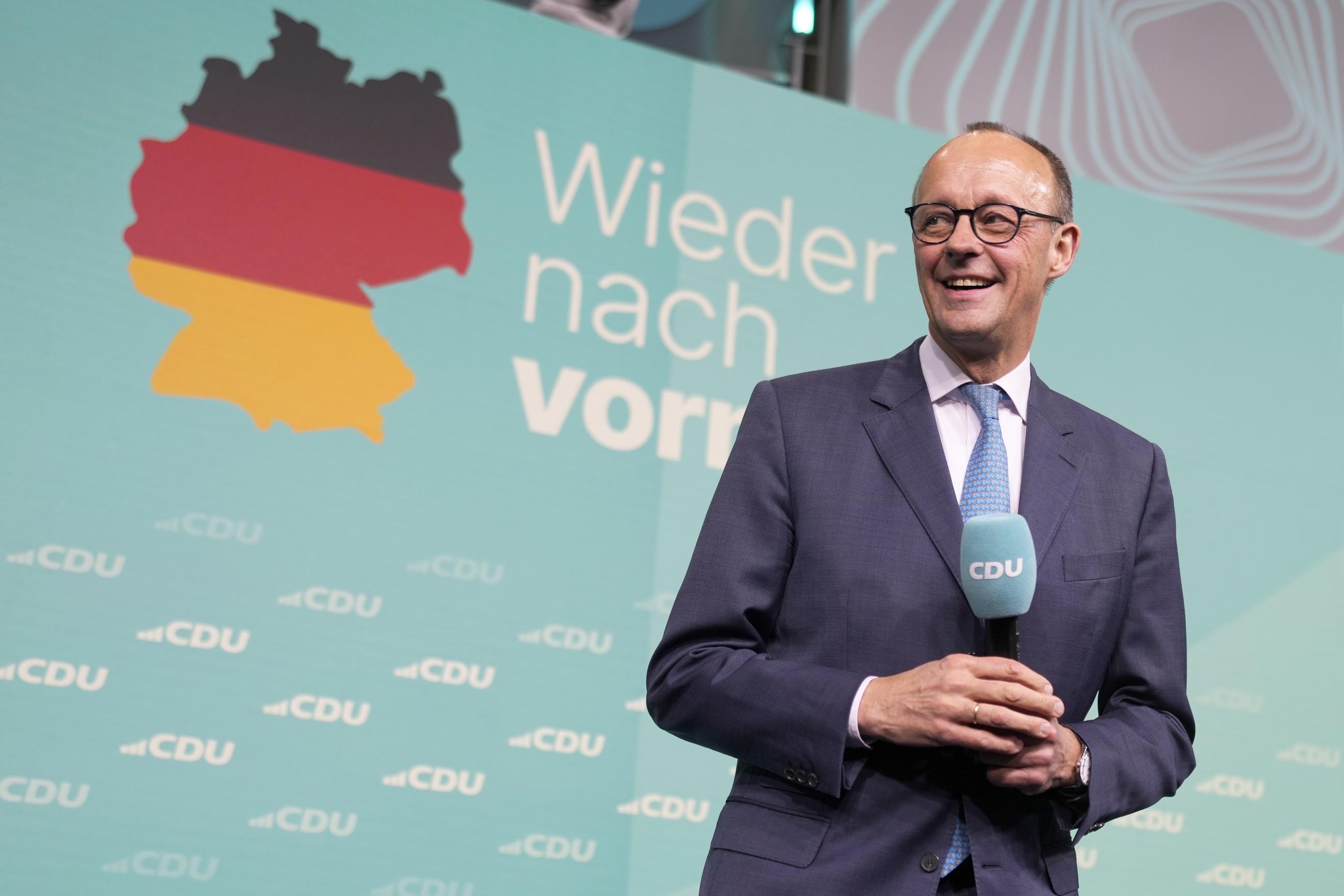 Friedrich Merz addressing supporters Sunday after the German national election (AP Photo/Markus Schreiber)