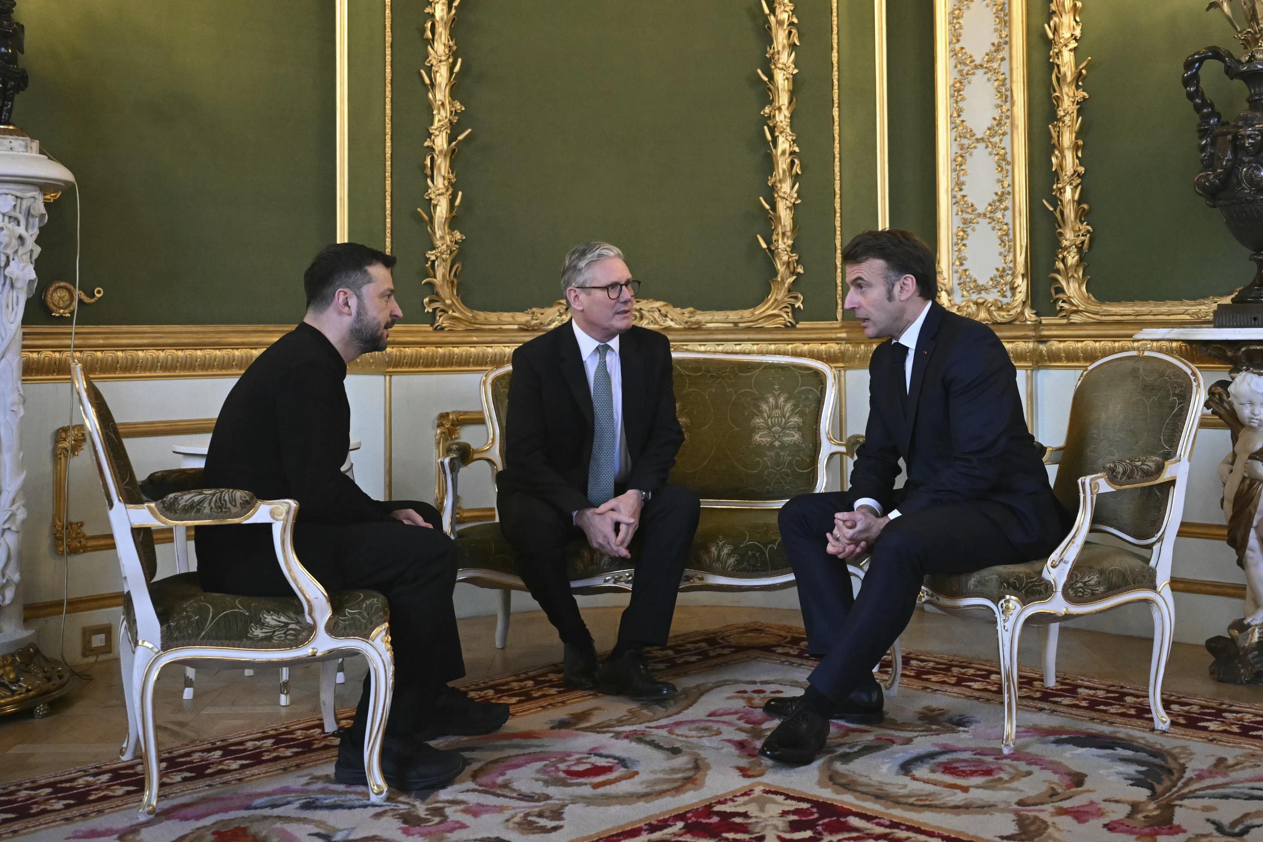 Ukrainian President Volodymyr Zelensky, British Prime Minister Keir Starmer, and French President Emmanuel Macron meeting in London on Sunday (Justin Tallis/Pool via AP)