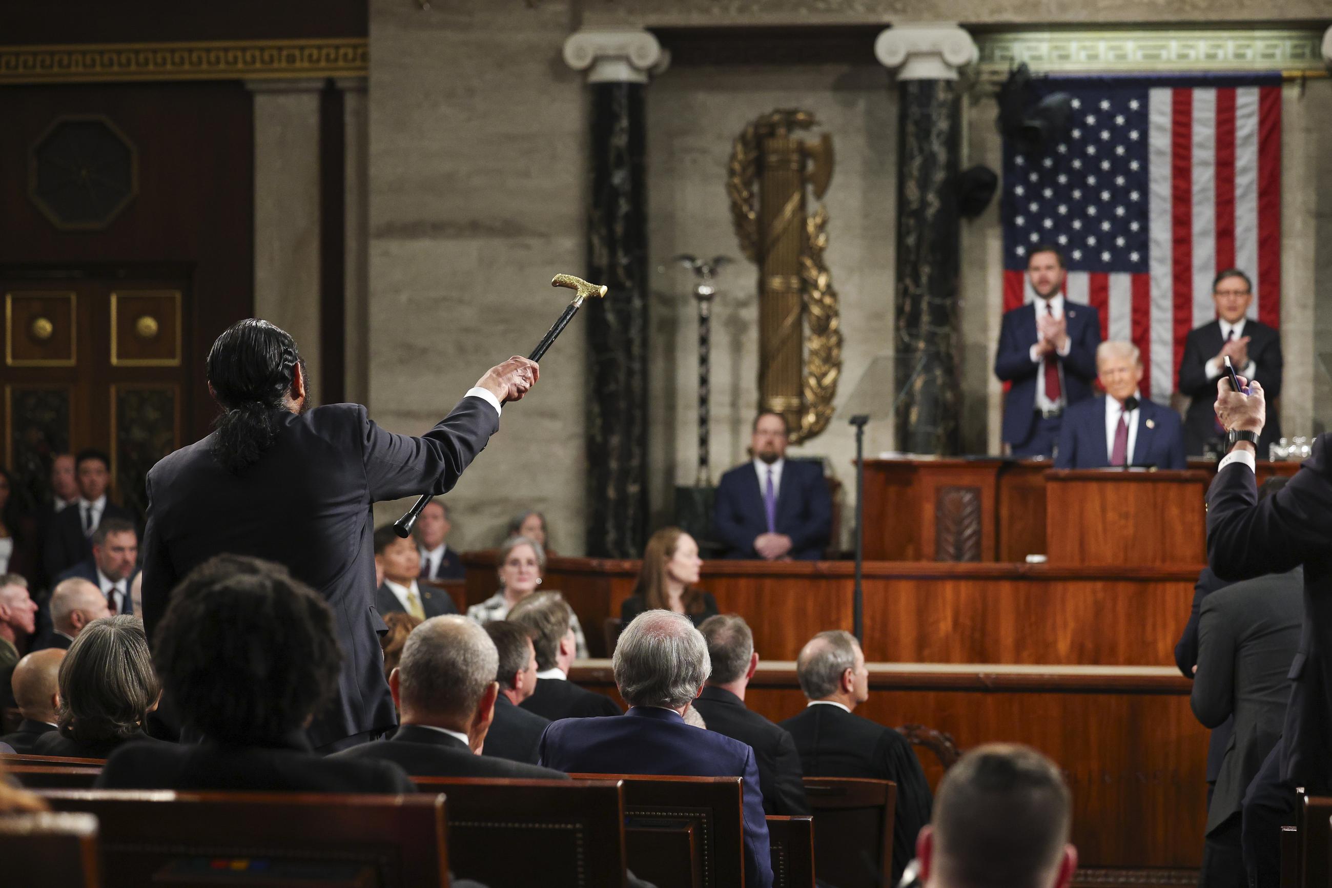 Rep. Al Green shouts as President Trump addresses a joint session of Congress Tuesday. (Win McNamee/Pool Photo via AP)