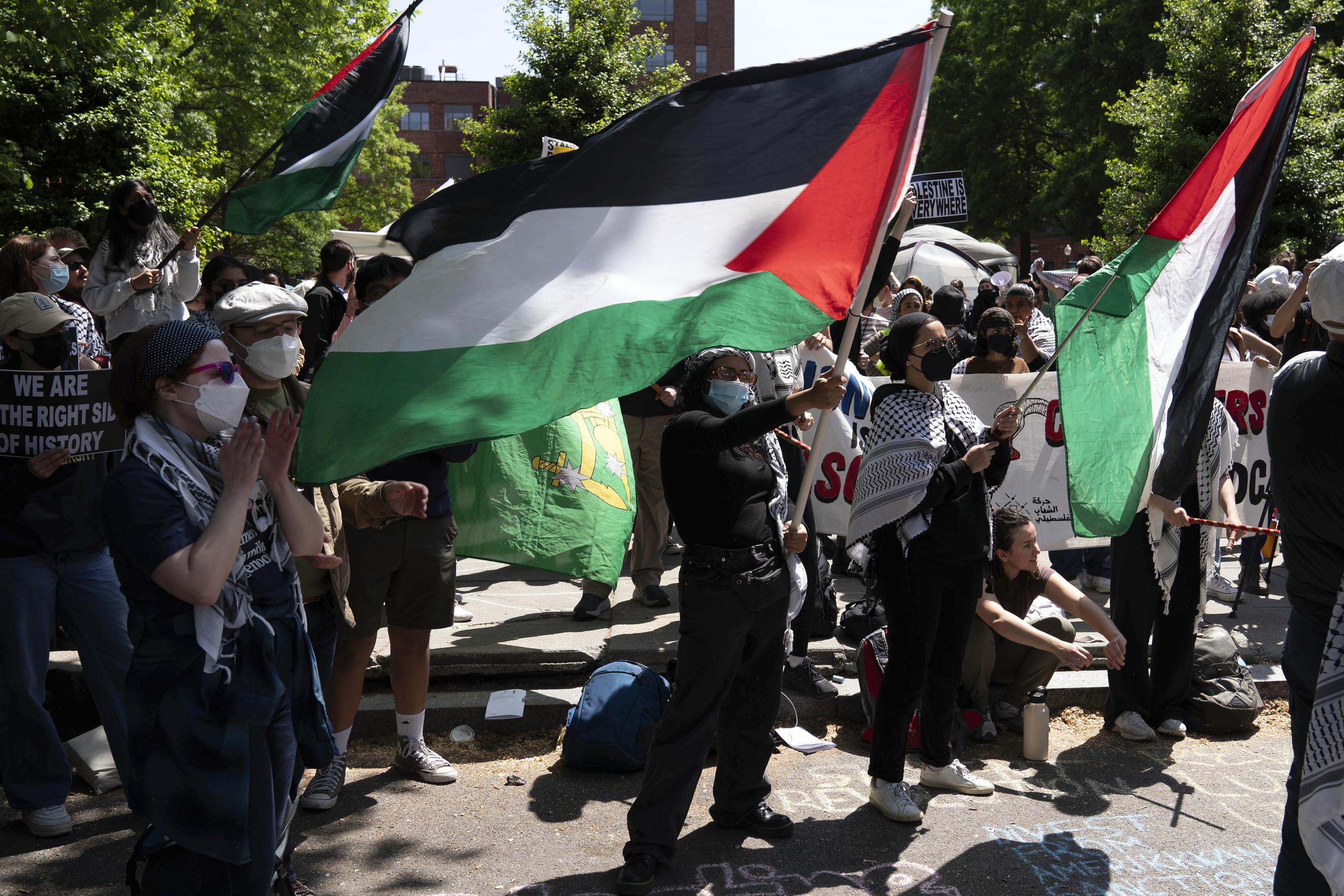 George Washington University students demonstrate on the street during a pro-Palestinian protest over the Israel-Hamas war in April 2024. (AP Photo/Jose Luis Magana)