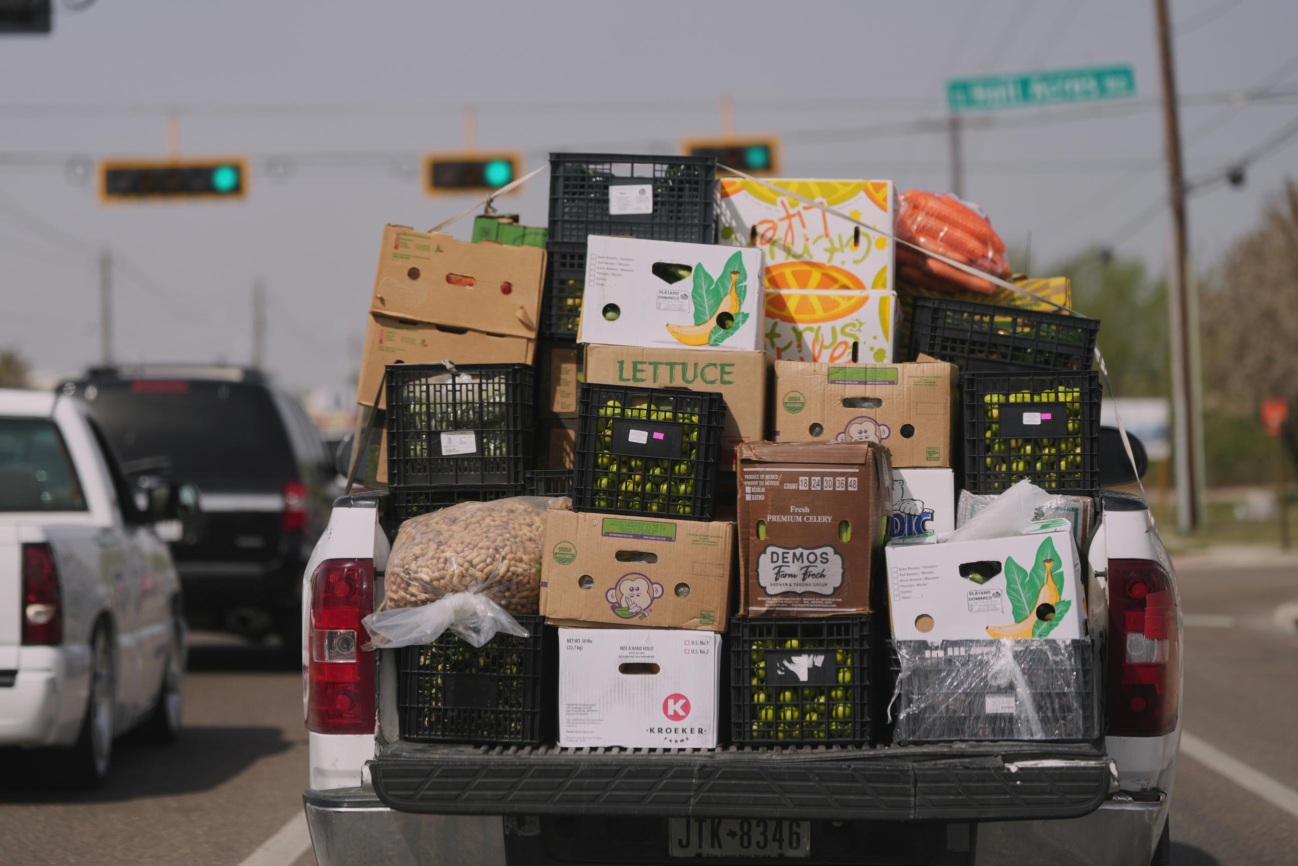 A truck loaded with produce from Mexico and Canada passes through Pharr, Texas, on March 4. (AP Photo/Eric Gay)
