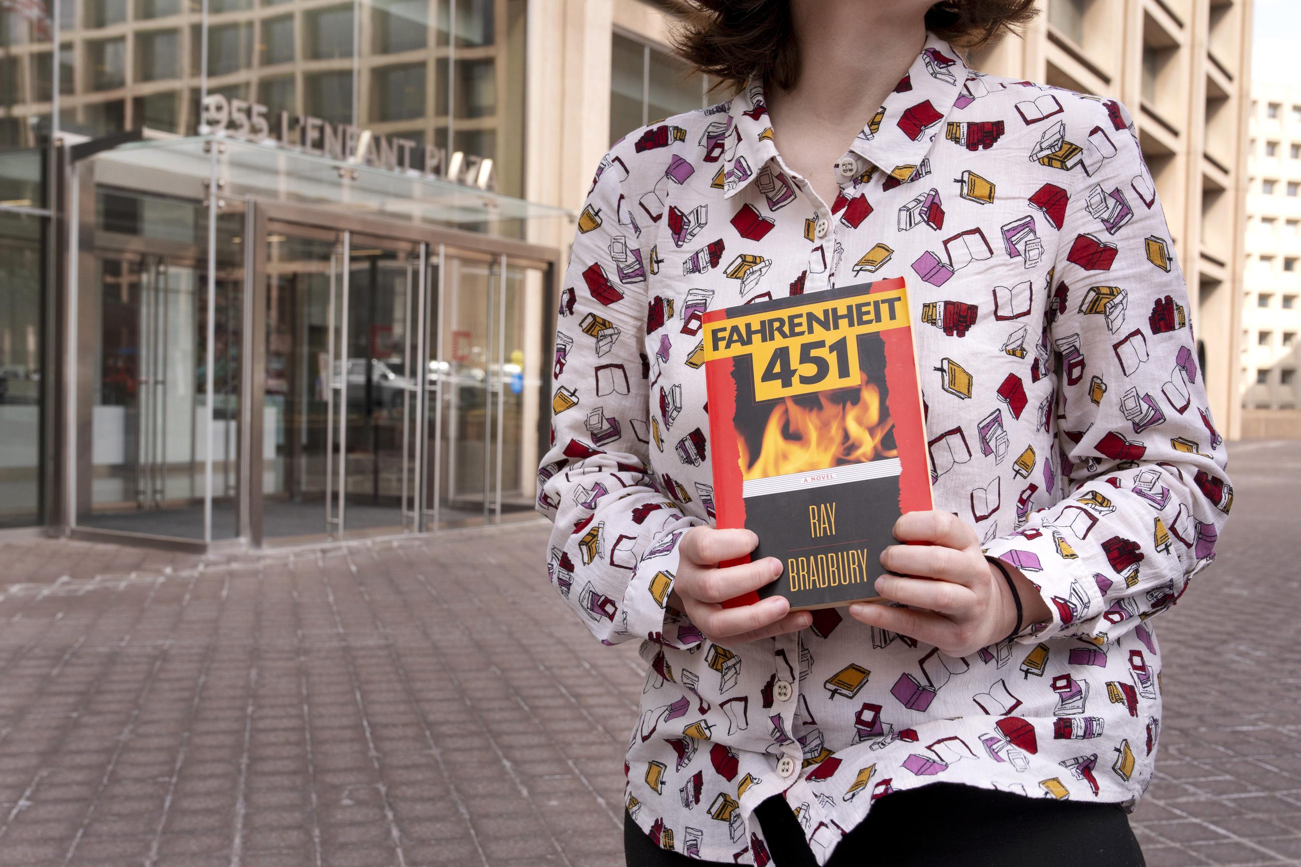 A demonstrator supporting the Institute of Museum and Library Services outside its offices on March 20, after news emerged that Department of Government Efficiency employees had shown up at the facility (AP Photo/Jacquelyn Martin)