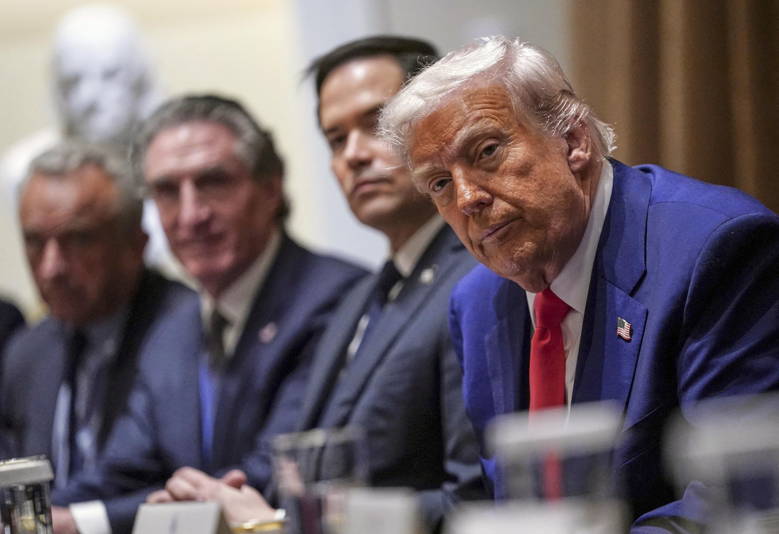 President Donald Trump, from right, Secretary of State Marco Rubio, Interior Secretary Doug Burgum and Health and Human Services Secretary Robert F. Kennedy, Jr., attend a cabinet meeting at the White House in Washington, D.C., U.S., April 10, 2025. REUTERS/Nathan Howard