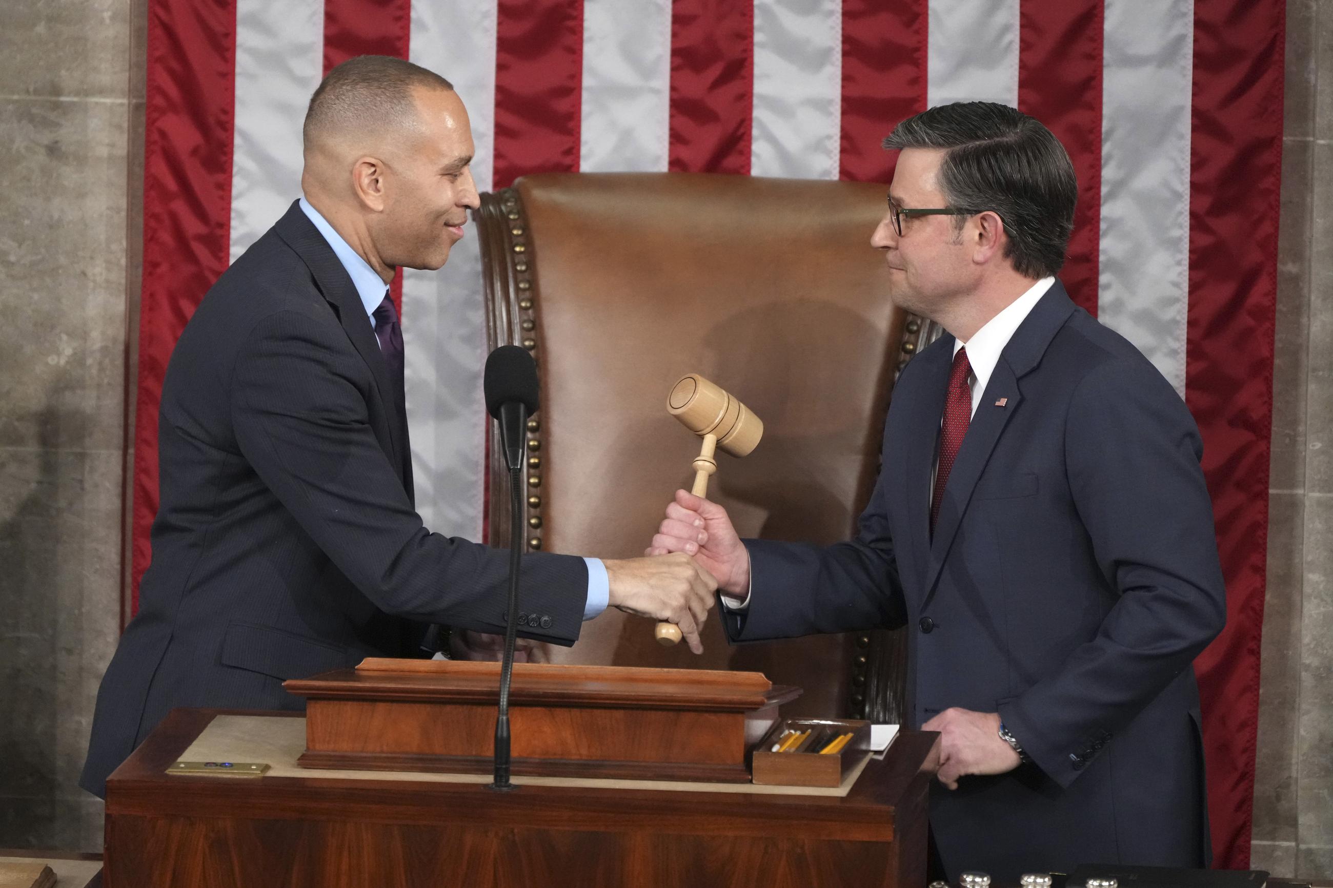 House Minority Leader Hakeem Jeffries handing the gavel to Speaker Mike Johnson as the House met to elect a speaker and convene the 119th Congress on Jan. 3 (AP Photo/Jacquelyn Martin)