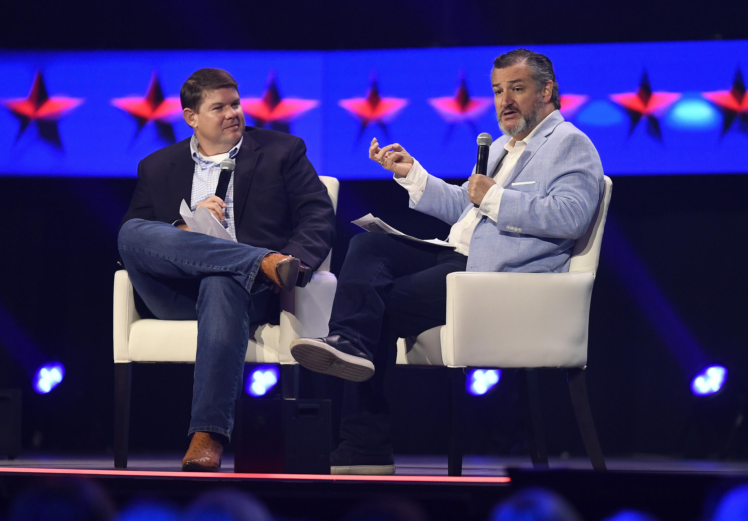 Ben Ferguson records a podcast with Sen. Ted Cruz during the Turning Point Action Conference in Florida in 2023. (AP Photo/Michael Laughlin)