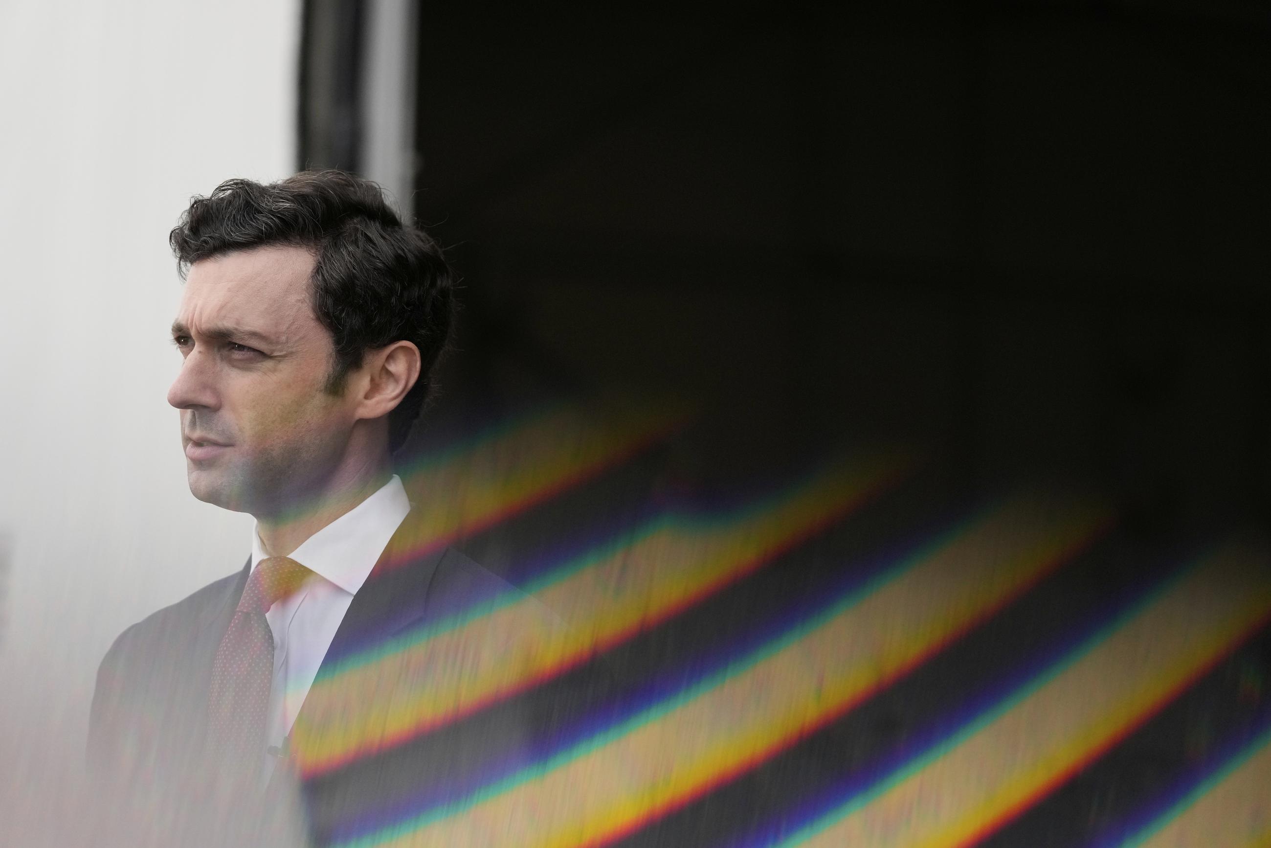 Sen. Jon Ossoff, D-Ga., speaks during an interview at Dobbins Air Reserve Base, Saturday, April 26, 2025, in Marietta, Ga. (AP Photo/Brynn Anderson)