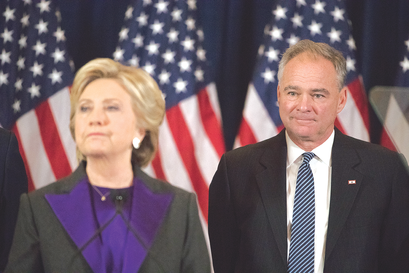 Kaine and Hillary Clinton conceding defeat to Donald Trump on Nov. 9, 2016 (AP Photo/Matt Rourke)