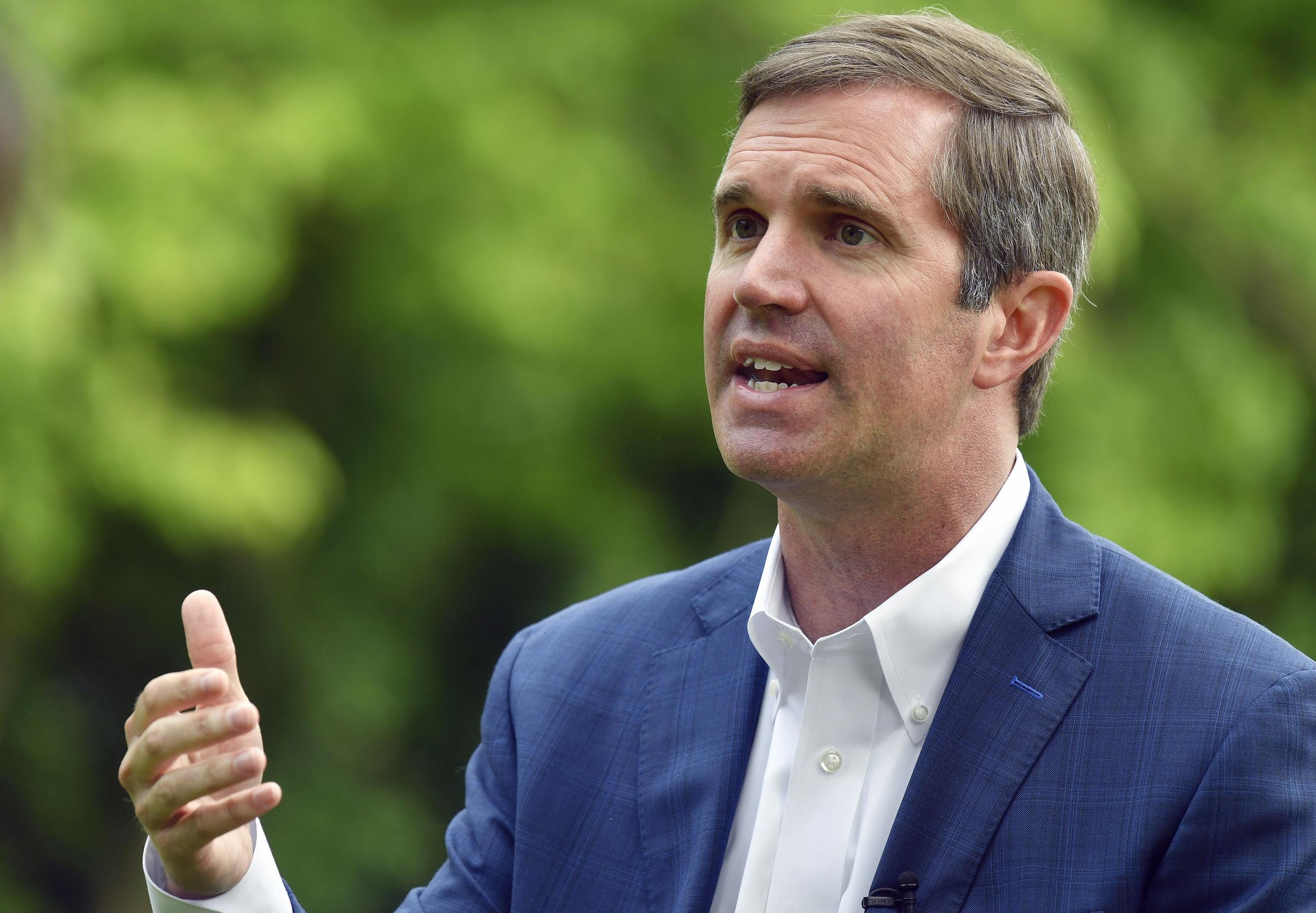 FILE - Kentucky Gov. Andy Beshear sits for an interview in Versailles, Ky., May 17, 2023. (AP Photo/Timothy D. Easley, File)