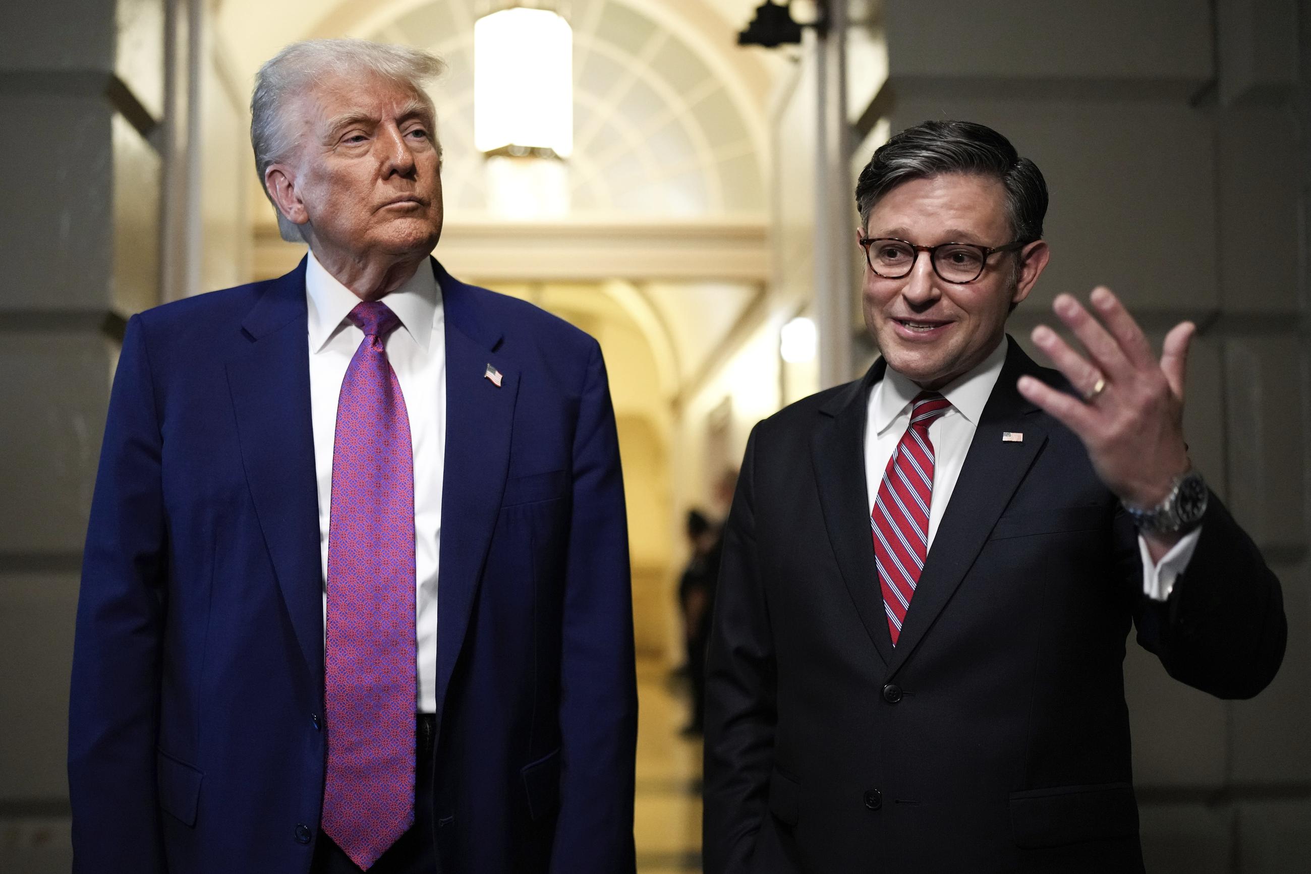 President Trump and House Speaker Mike Johnson speak to reporters after departing a House Republican conference meeting Tuesday. (AP Photo/Julia Demaree Nikhinson)