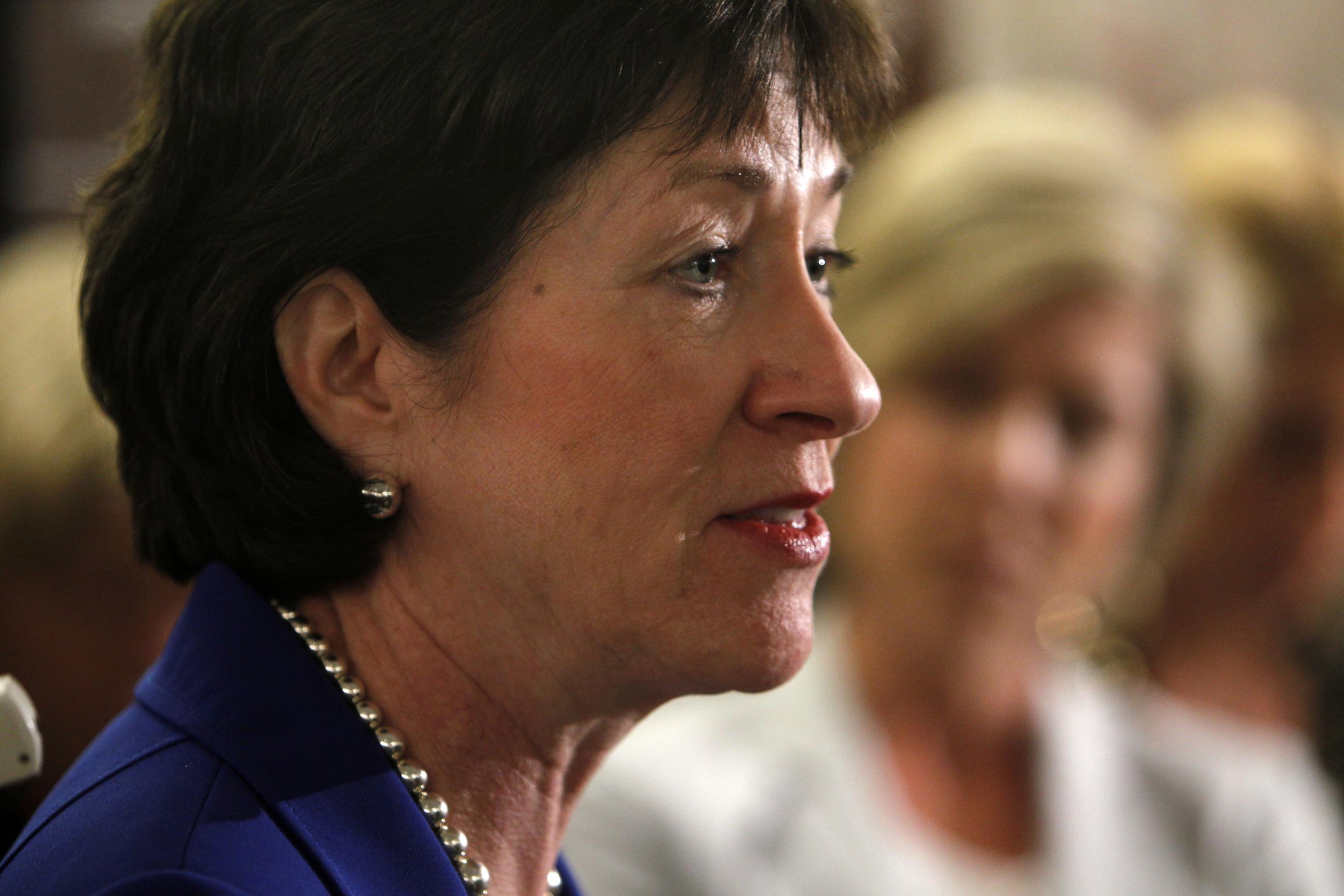 Sen. Susan Collins, R-Maine, speaks to reporters after a private meeting with Treasury Secretary Timothy Geithner regarding financial reform at her office on Capitol Hill in Washington, Monday, April 19, 2010. (AP Photo/Charles Dharapak)